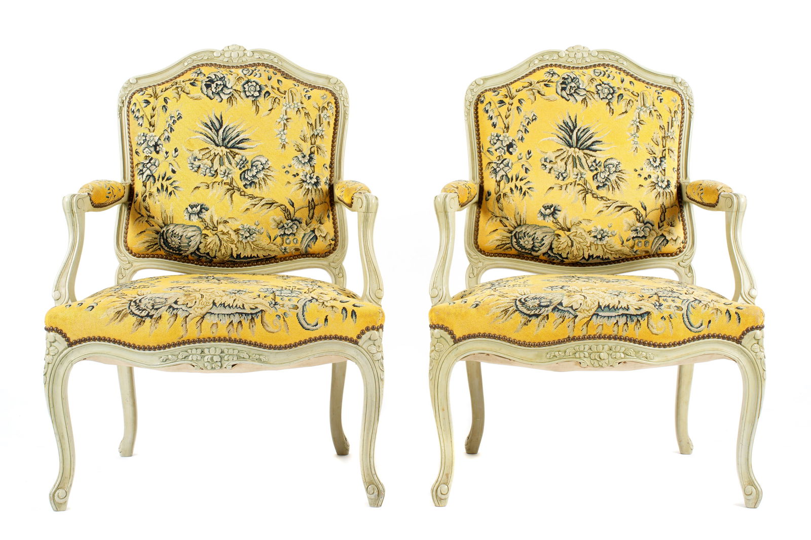 Pair Danish Royalty Descended Fauteuil Chairs: Pair of French fauteuil arm chairs, carved and painted frames with rich floral tapestry upholstery. Descended through members of the Danish Royal family. According to a signed document from HRH Prince
