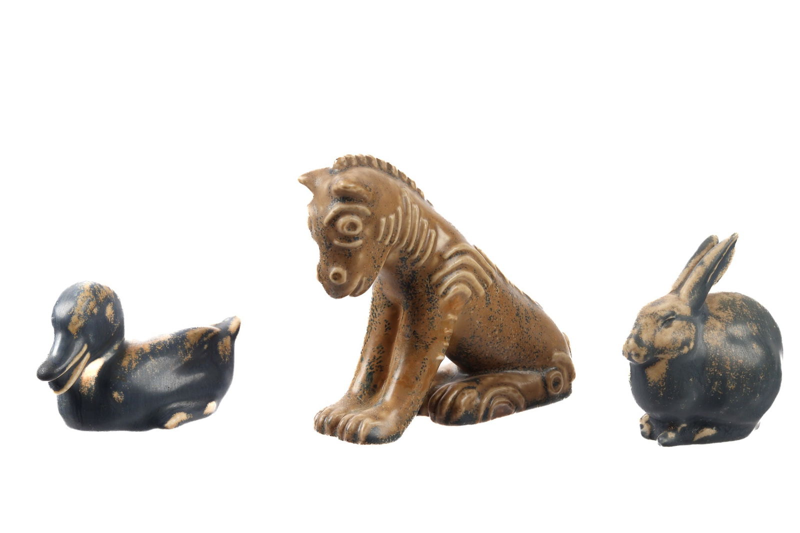 Three Piece Rookwood Pottery Animal Paperweights: Three pieces total to include 1) Bunny rabbit, mottled blue matte glaze, mold 6160, 1930 date mark, 3" h. x 3". 2) Duck, mottle blue matte glaze, mold number 6064, 1929 date mark. 2" h. x 3.75". 3) Lo