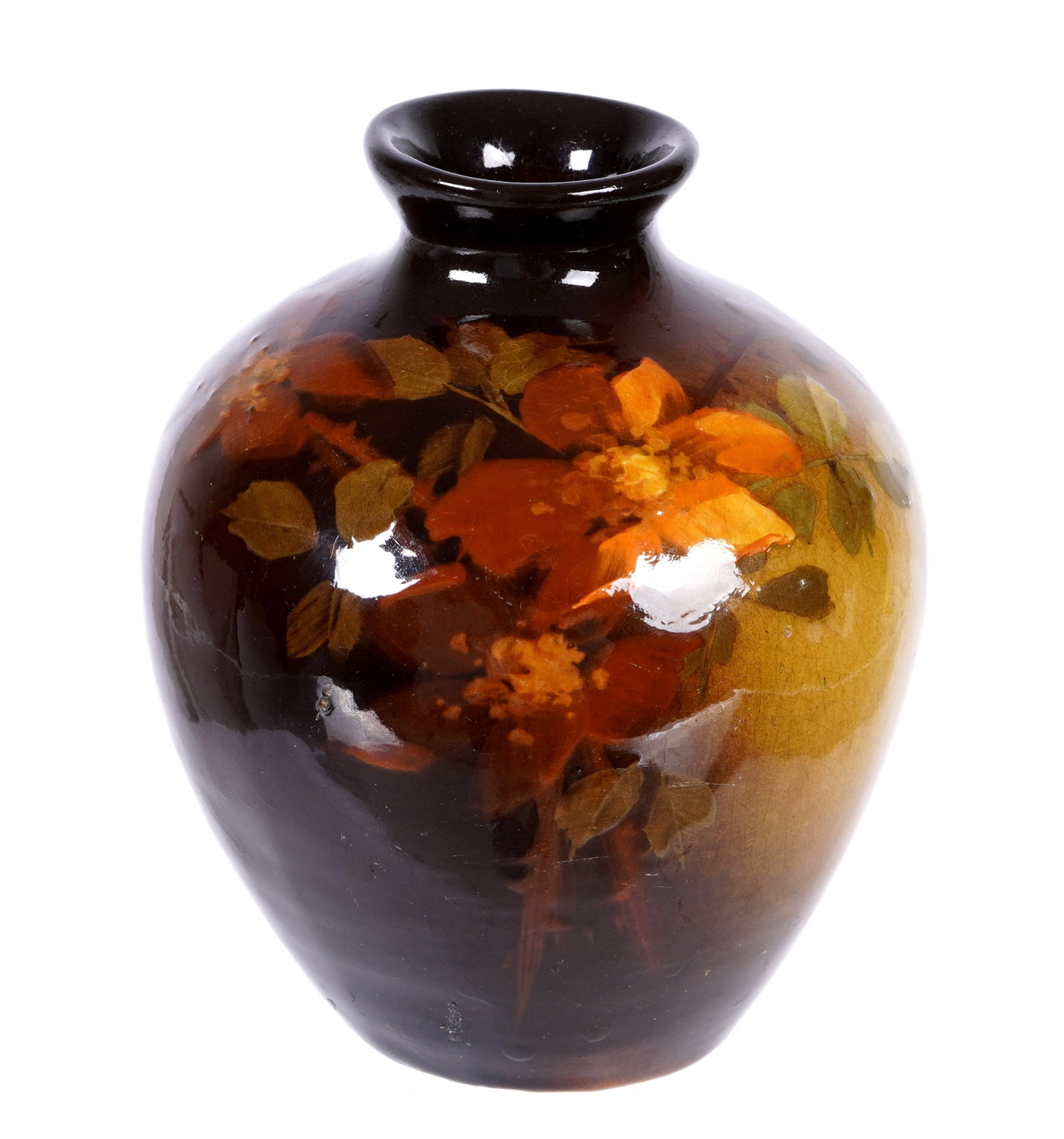 J. B. Owens Utopian Standard Glaze Vase: Squat standard glaze vase with floral decoration, impressed J. B. OWENS, UTOPIAN, mold number 942, overall 5" h. x 4". Condition: Crazing, several scratches or abrasions, small spot of inpaint.