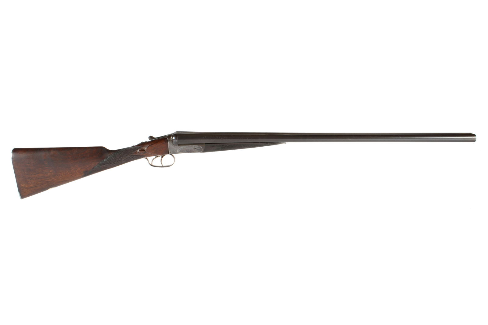 Cogswell & Harrison 12ga Double Barrel Shotgun: Serial number 41495, hammerless side by side, 12 gauge, barrel length 30", 14.75" length to pull, checkered walnut stock, overall 46.5" long. Condition: Spotting to barrel exteriors, minor chips to fo