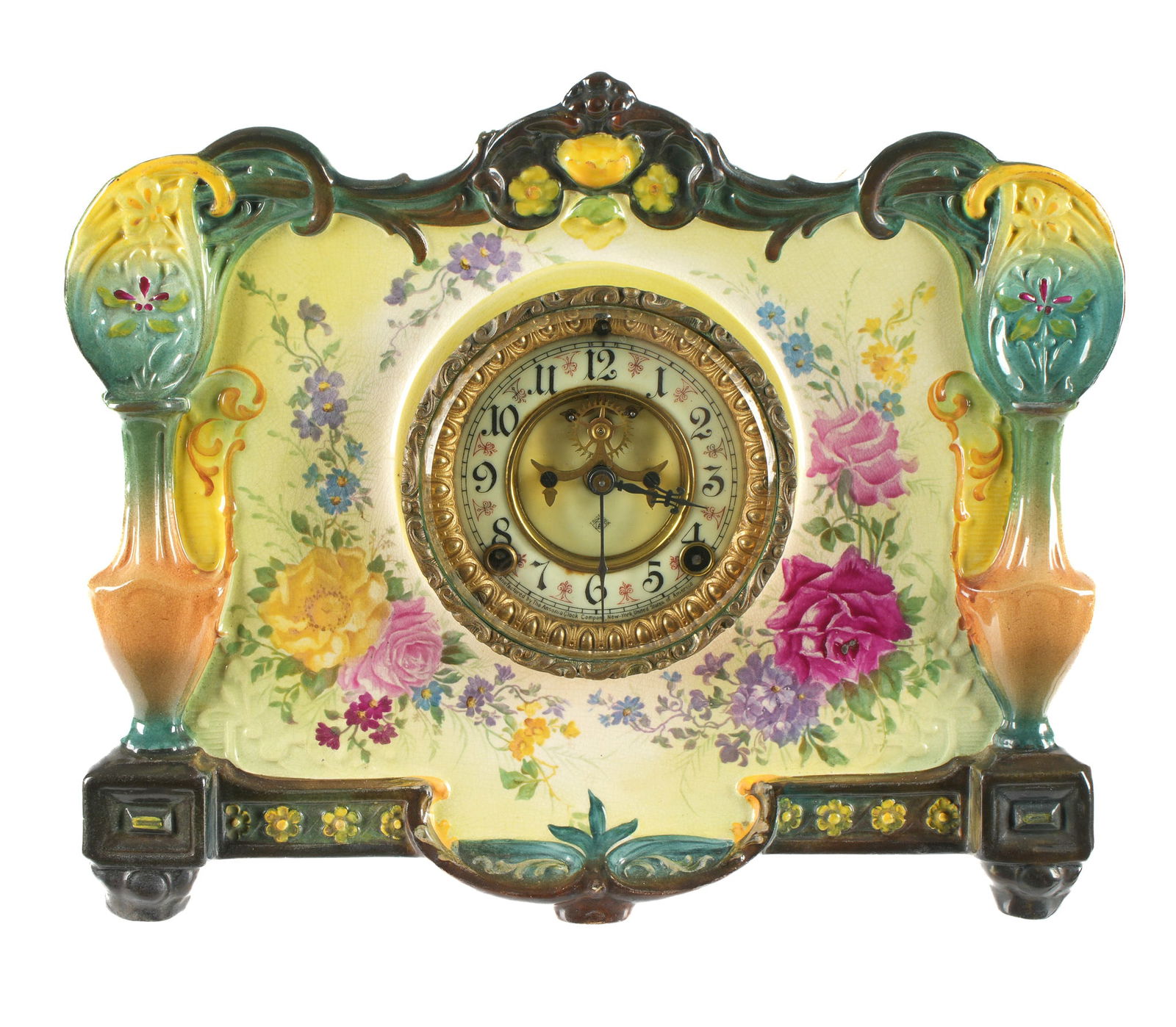 Royal Bonn La Roca Ansonia Mantel Clock: Royal Bonn "La Roca" porcelain mantel clock, hand painted floral decoration. Enamel dial with open escapement, marked Ansonia. Ansonia time and gong strike movement. Overall 11.5" h. x 14" x 4.75". Co