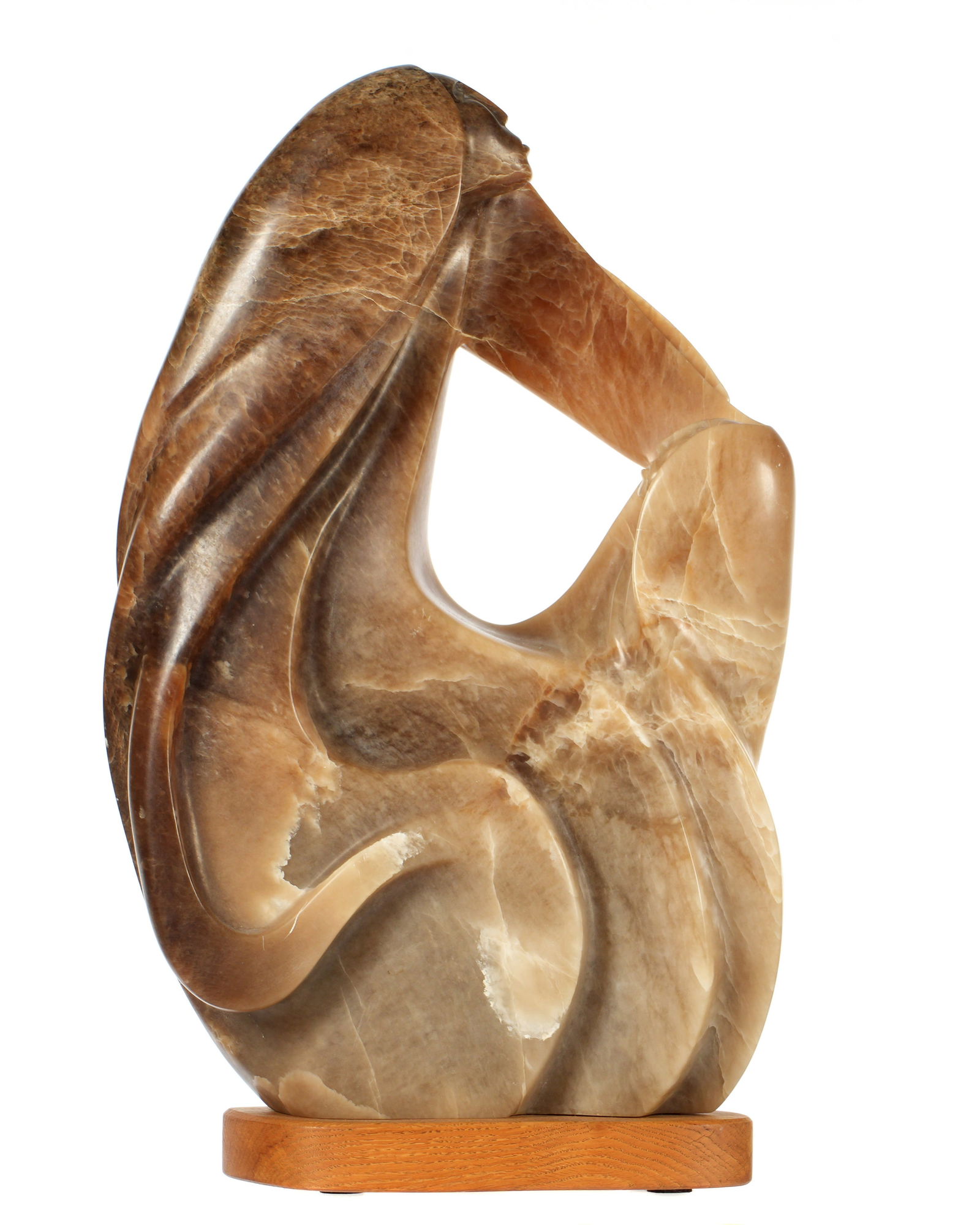 Southwest Modernist Carved Alabaster Sculpture: Carved alabaster sculpture depicting bust of Native American chieftain and maiden, signed "Don J. E." verso near base. Affixed to wood plinth, overall 25.25 h. x 15" x 4.5".