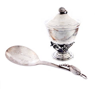 Jensen Sterling Blossom Spoon & De Matteo Sugar: An assembled collection of two sterling silver pieces total to include 1) Georg Jensen pierced serving spoon in the Blossom pattern, #84, 8.5" long. 2) De Matteo hand hammered covered sugar bowl,