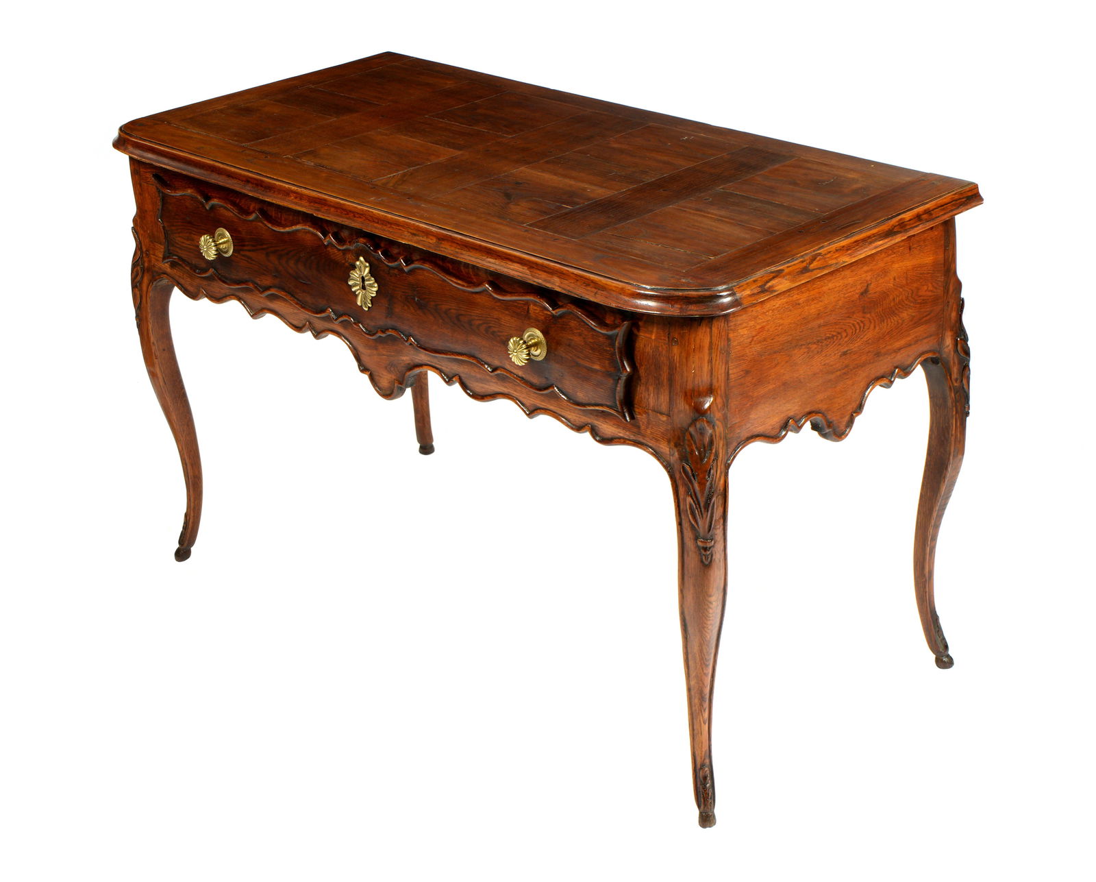 19th Century French Provincial Parquetry Table: Pegged walnut parquetry top over single serpentine drawer, brass pulls and escutcheon, carved and shaped cabriole legs. Overall 33" h. x 54" x 22". Condition: Scratches and wear to top, other wear con