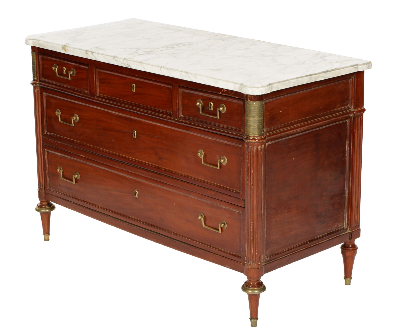 French Louis XVI Mahogany Marble Top Commode: Variegated white marble top with cookie corners over mahogany case. Three drawers over two full length drawers, brass pulls. Fluted column stiles, brass accents at top. Tapered legs. Overall 34" h .x