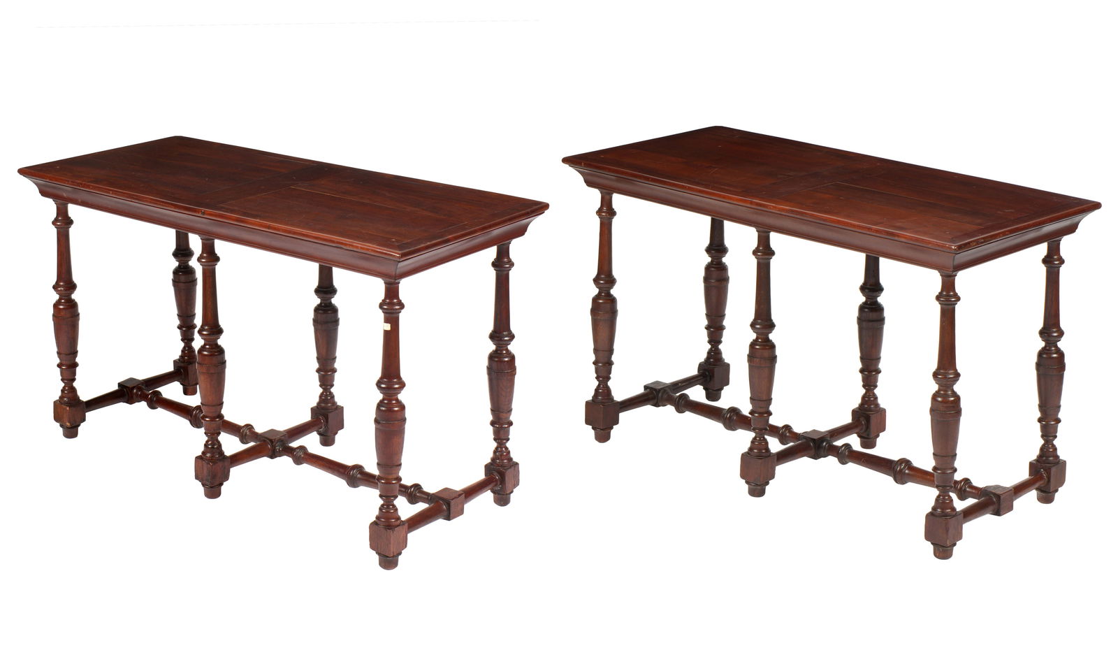Pair French Mahogany Console Tables: 18th Century and later elements, pegged rectangular top, six turned legs and turned stretchers. Overall 33 h. x 53.5" x 24.75". Condition: Scratches to tops, repair to one support, other wear consiste