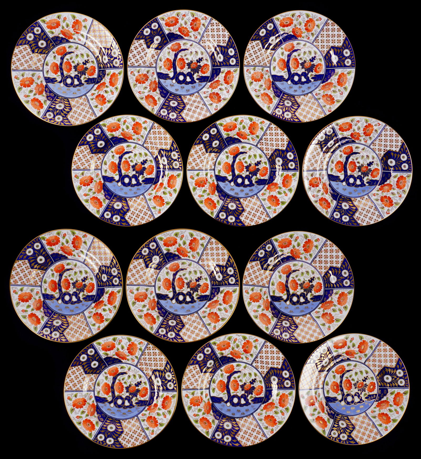 Set of Twelve Wedgwood Japan Dinner Plates: Set of twelve plates in the "Japan" pattern by Wedgwood, retailed by T. Goode & Co. London. Each 10.5" dia. Overall condition excellent.