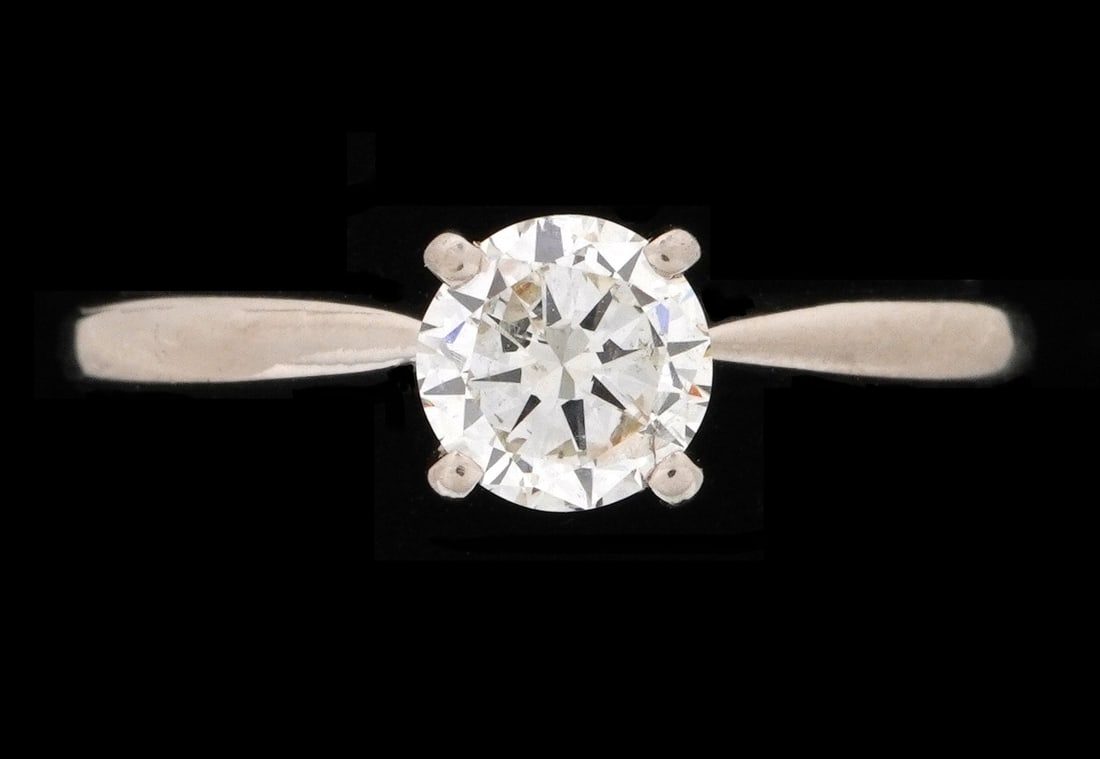 14k White Gold Diamond Solitaire Ring: 14k white gold band, approx. .75 ct round prong set diamond. Size 8. Approx 2.4 grams inclusive.
