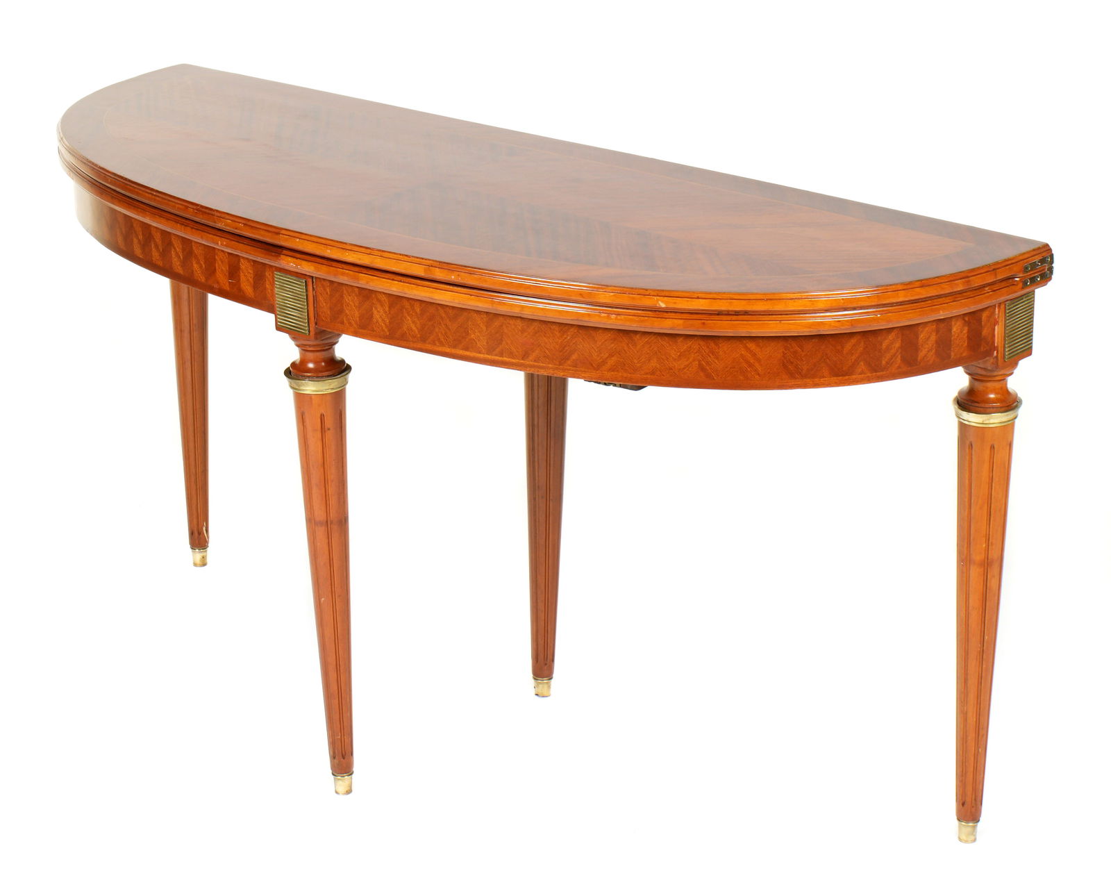 attr. Maison Jansen Demilune Console Dining Table: Mahogany console table, banded mahogany and satinwood hinged top converts to dining table. Parquetry inlaid apron, gilt bronze mounts at joints. Tapered and fluted legs. Overall 31.25" h. x 60" x 20.5