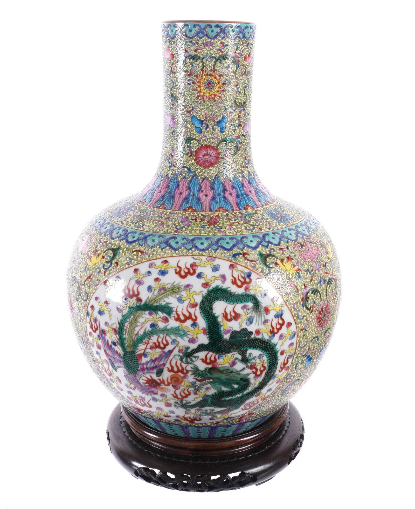 Chinese Famille Jaune Porcelain Vase: Tianqiuping globular form porcelain vase with extended neck. Famille Jaune decorated with dragon and phoenix in reserves. Marked on base with 6 character Qianlong mark. Overall 15.75" h. x 10" dia. So