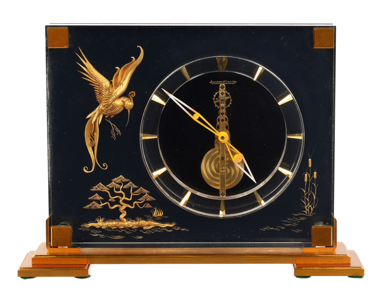 Jaeger-LeCoultre Marina Chinoiserie Mantle Clock: Gilt Phoenix bird, tree, and cattails motif encased in Lucite frame, gilt brass base. 16 jewel time only movement. Stamped 350 under foot. Overall measures 6.5" h. x 8.75" x 2". Condition: Minor crazi