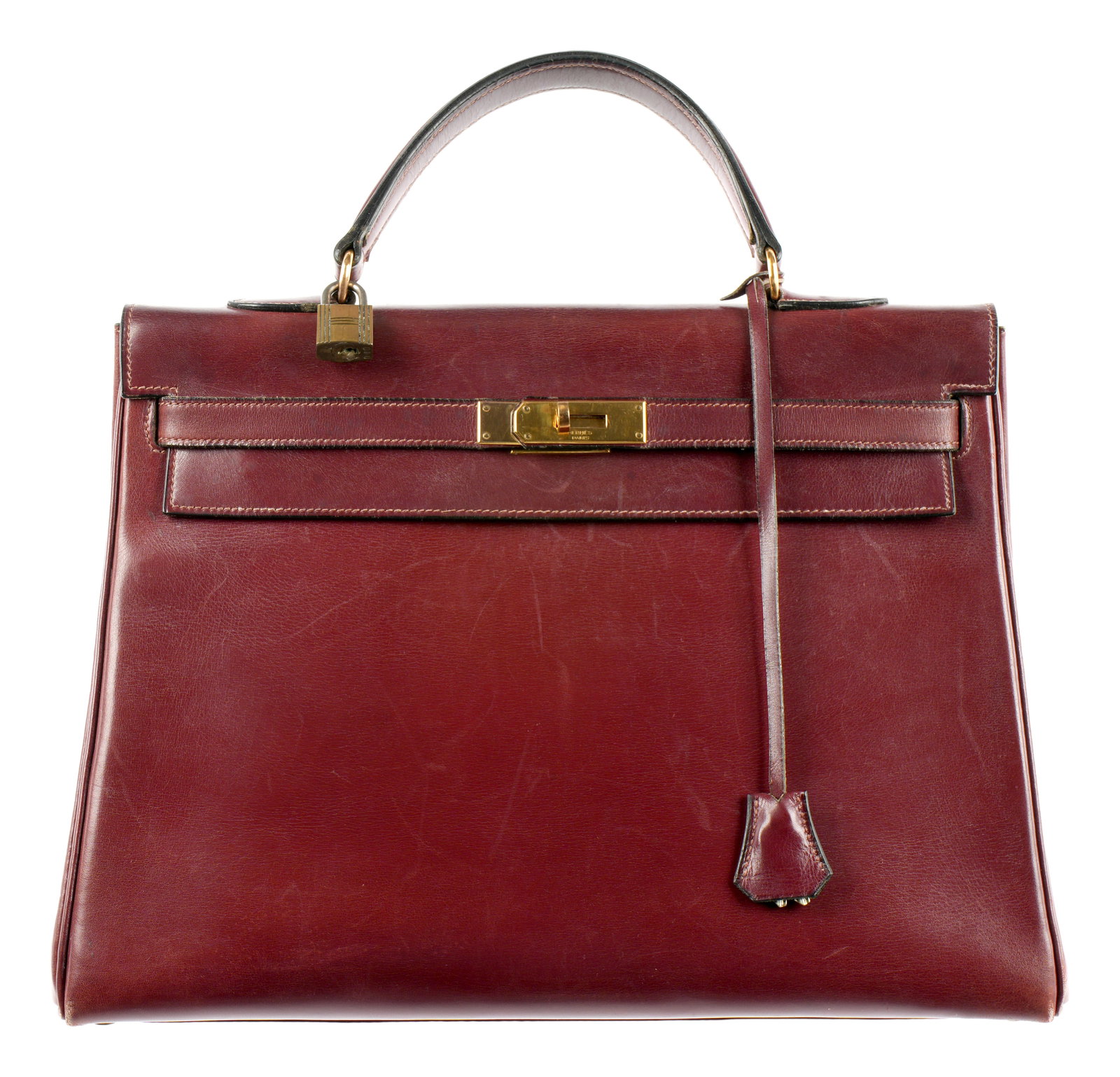Vintage Hermes Kelly 35 Rouge Leather Hand Bag: Rouge leather "Kelly 35" hand bag by Hermes, single handle top, gold toned clasp with rotating lock. Well marked, internal pockets. Overall 35cm high including handle x 35 cm x 14cm (14" x 14" x 5.75"