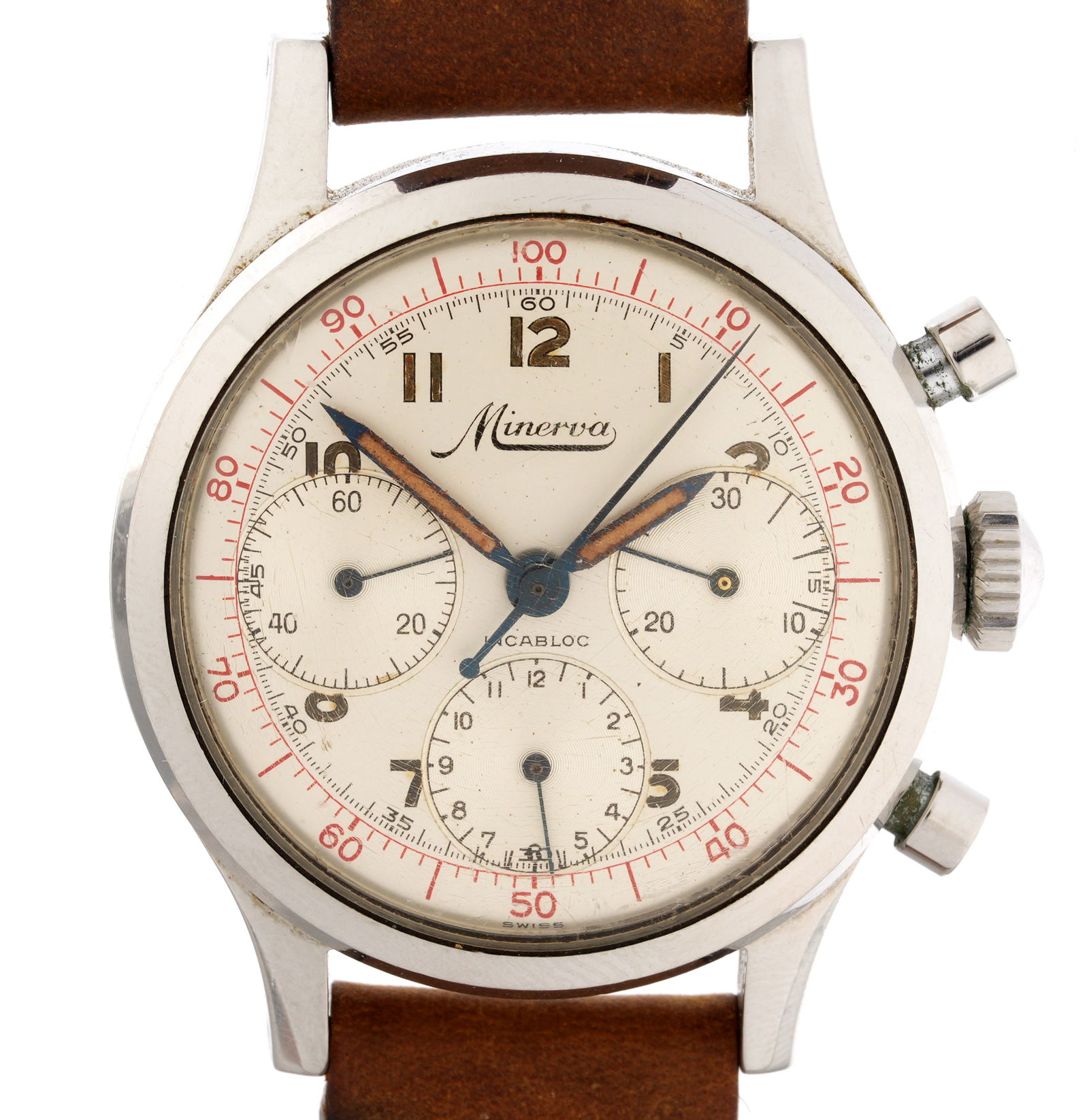 Minerva Incabloc Chronograph Triple Dial Watch: 35mm stainless steel case, manual wind movement, silver toned dial with three subsidiary dials for seconds, 30 minutes, and hours. Brown leather band, 9" long. Condition: Scratches to crystal, minor s
