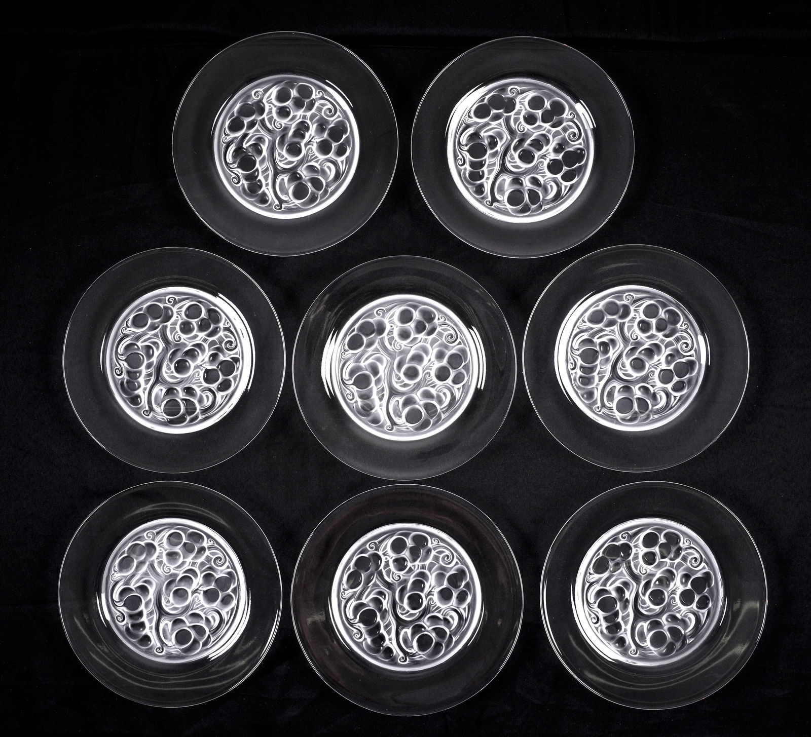 Set of Eight Lalique Crystal Marienthal Plates: Set of eight luncheon plates molded, opalescent, and clear crystal in the "Marienthal" pattern by Lalique, each signed Lalique France. 9 1/2" dia.