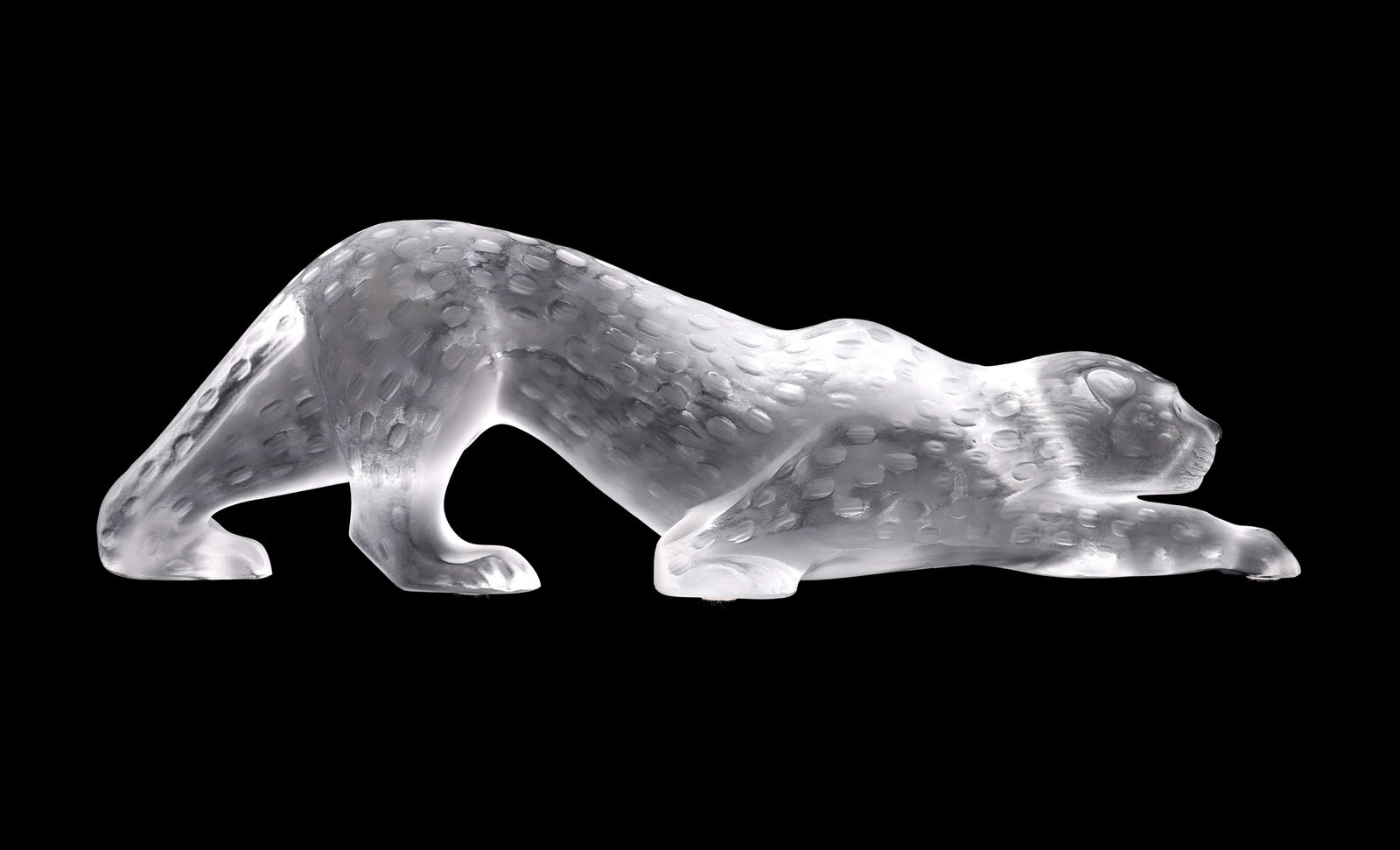 Lalique Zeila Panther Crystal Sculpture: Molded and frosted crystal "Zeila" figure of a crouching panther, signed underneath. 4.25" h. x 14.75" x 3".