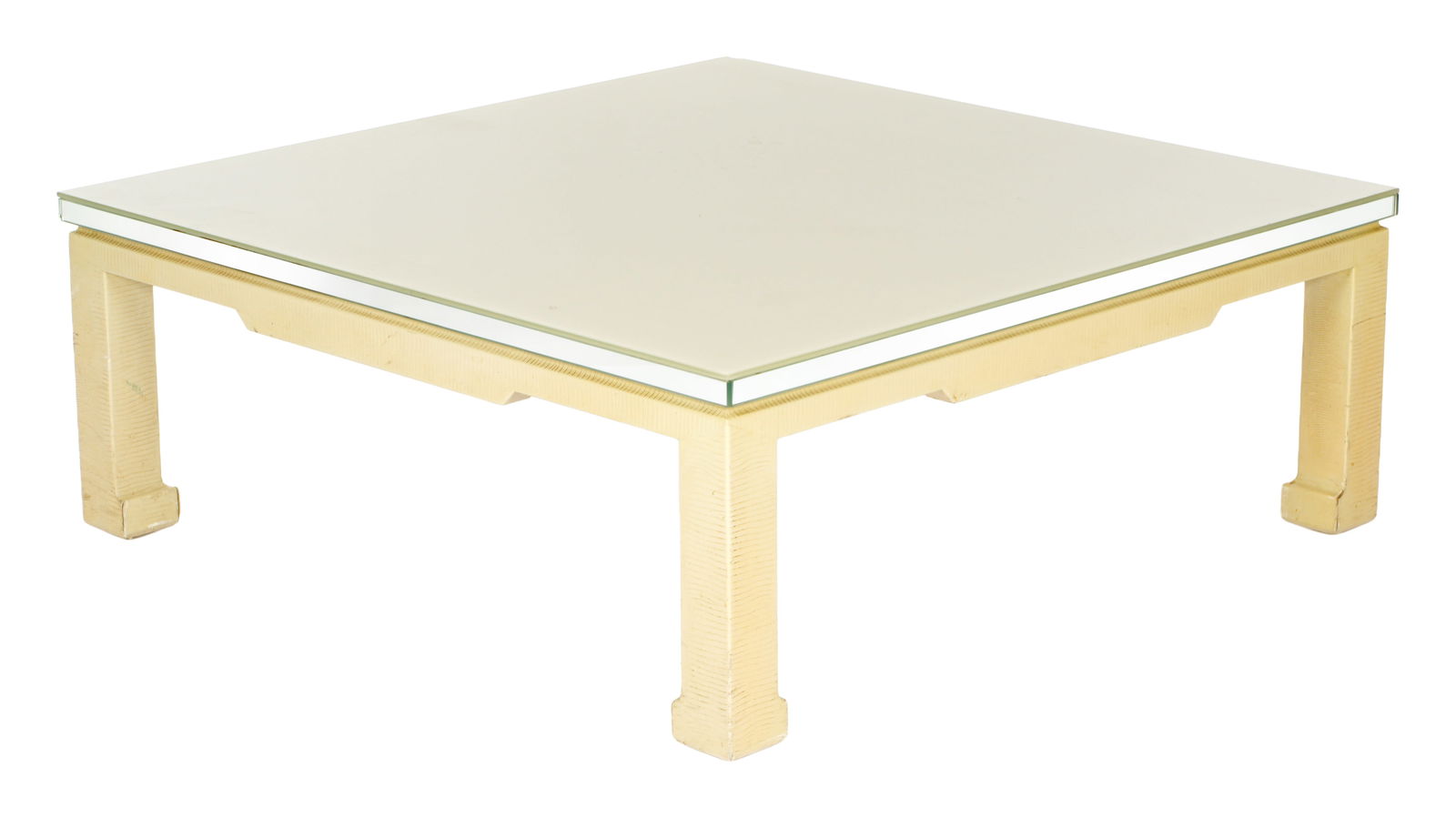 Karl Springer Style Lizard Skin Coffee Table: Square glass top over lizard skin clad base. Unsigned. Overall 15" h. x 40.5" x 40.5". Condition: Chip to corner of glass, wear to base.