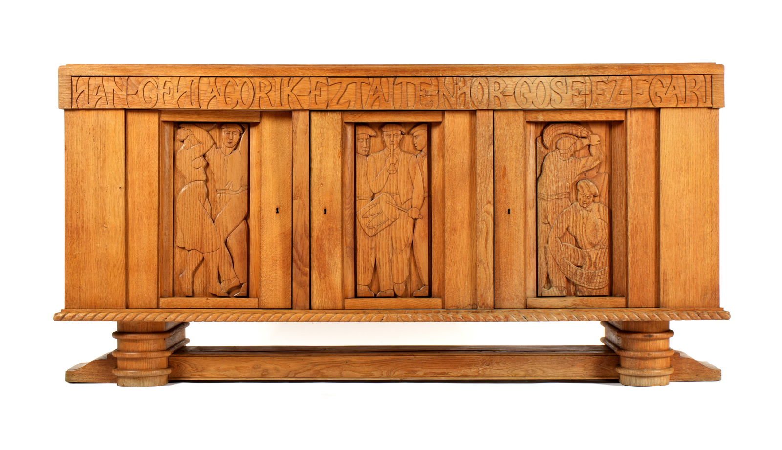 Large French Benjamin Gomez Carved Oak Sideboard: GOMEZ, Benjamin, (French 1885-1959): Exceptionally large sideboard / credenza by Benjamin Gomez, noted French architect. Five drawers with carved motto in Basque running entire length "Han Gehiagorik