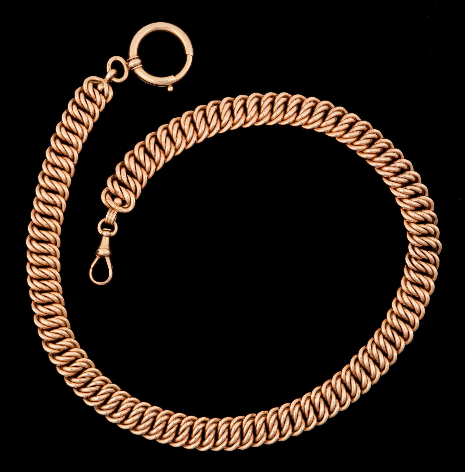 14k Rose Gold Continental Watch Fob 42 grams.: 14k rose gold, hallmarked noted on findings. 17.25" long. Approx. 42 grams. Condition: Small dings to links noted.