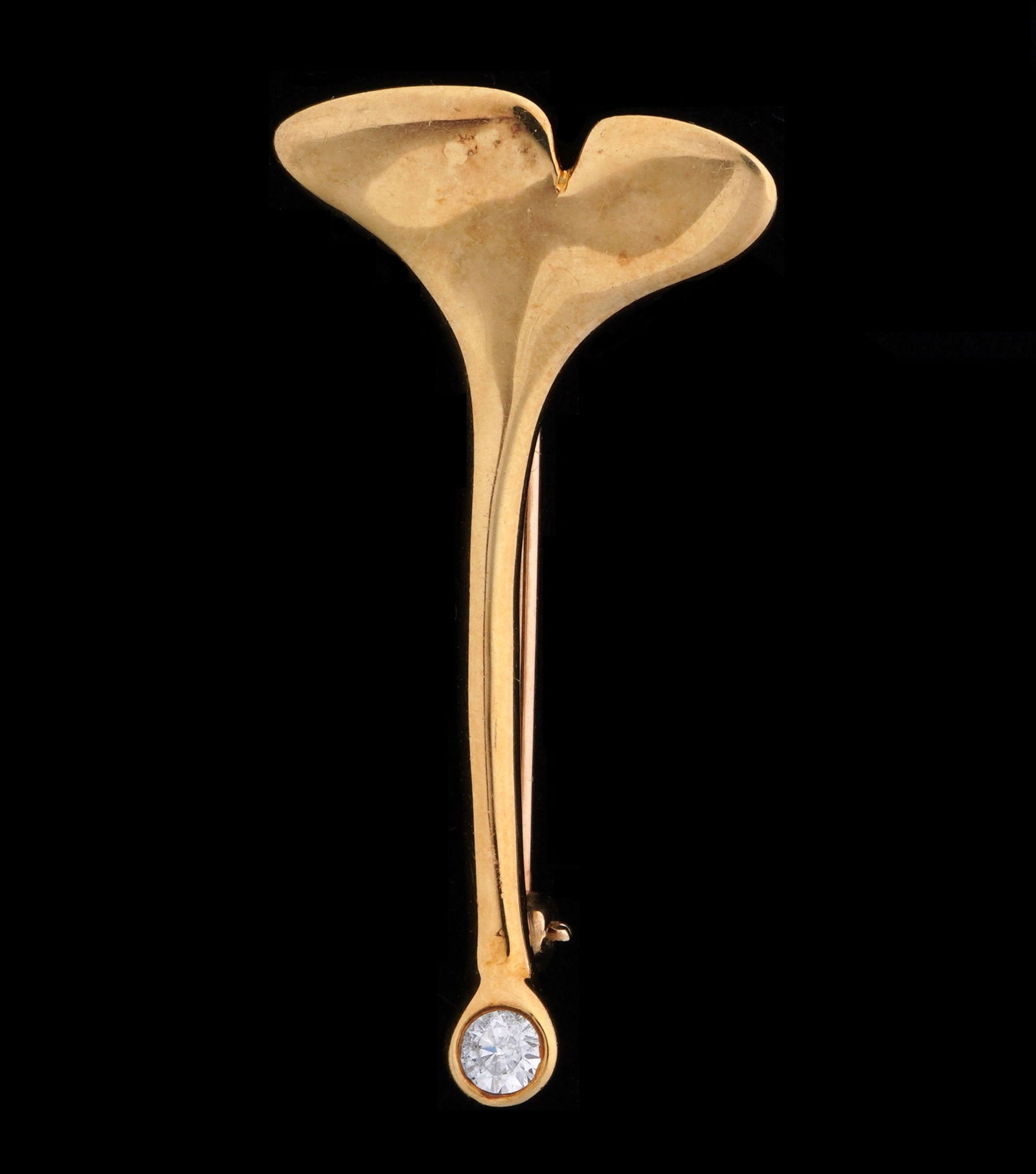 Tiffany & Co. 18K Gold & Diamond Whale Tale Brooch: 18k yellow gold with approx. .125ct bezel set diamond, well marked on tale. 1 3/8" long. approx. 4 grams inclusive.