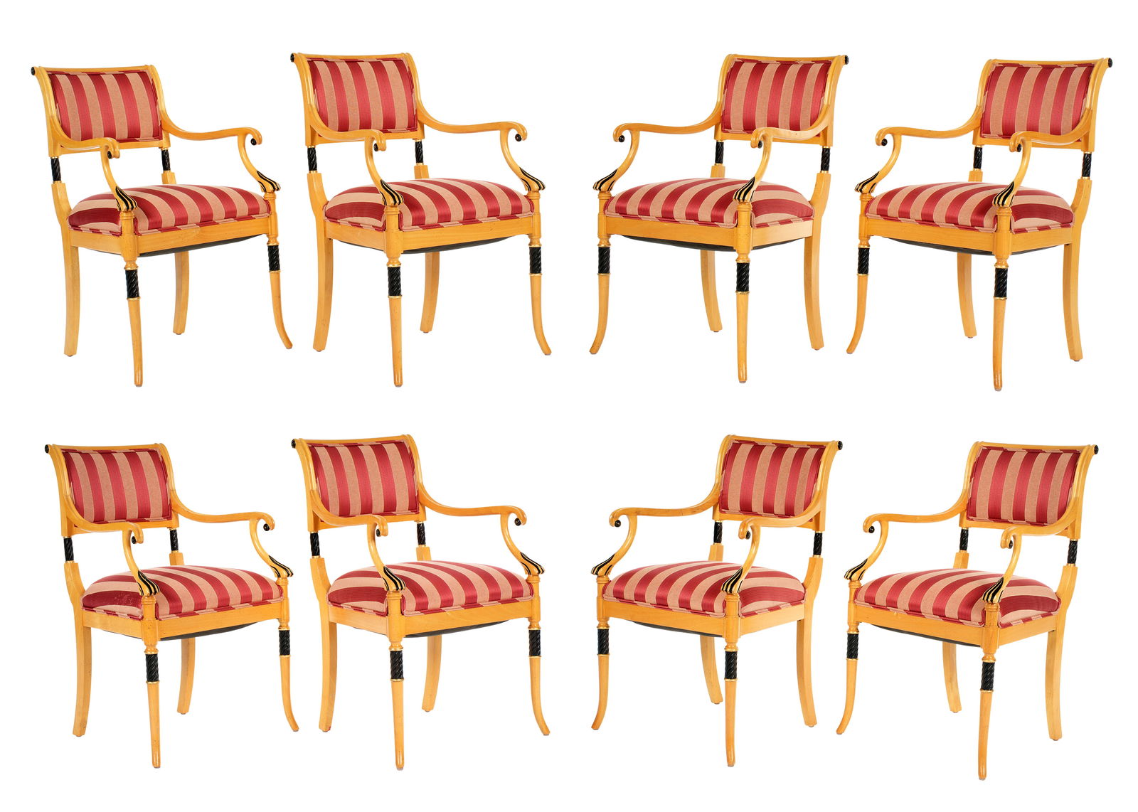 Eight English Regency Carved Arm Chairs: Carved and shaped frames, ebonized and gilt accents, striped pattern seats and backs. Overall 36.5" h. x 22.25" x 24.5". Seat height 20".