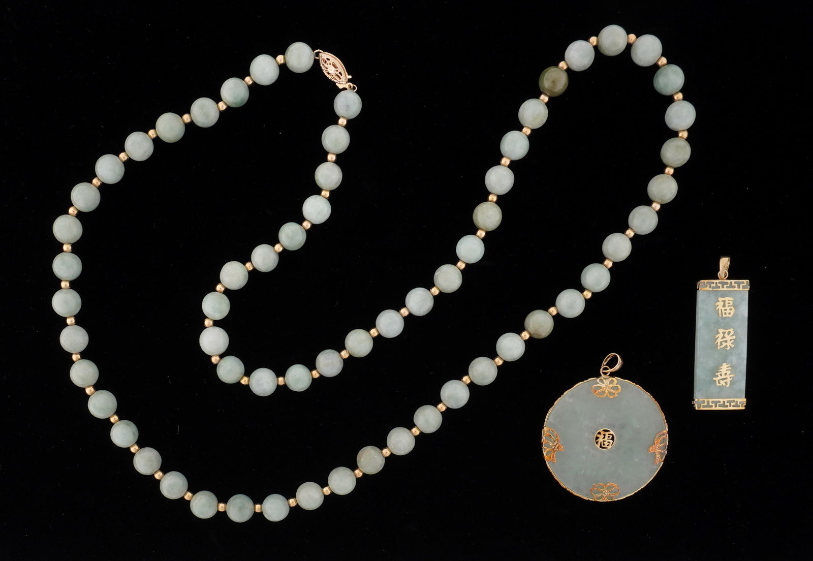 Chinese 14k Gold Jade Bead Necklace and 2 Pendants: Three pieces total, 14k yellow gold and celadon jade or similar stone to include 1) Gold and jade bead necklace, 25.5" long. 2) Round pendant, 1.5" dia. 3) Bar pendant 1.5" long.