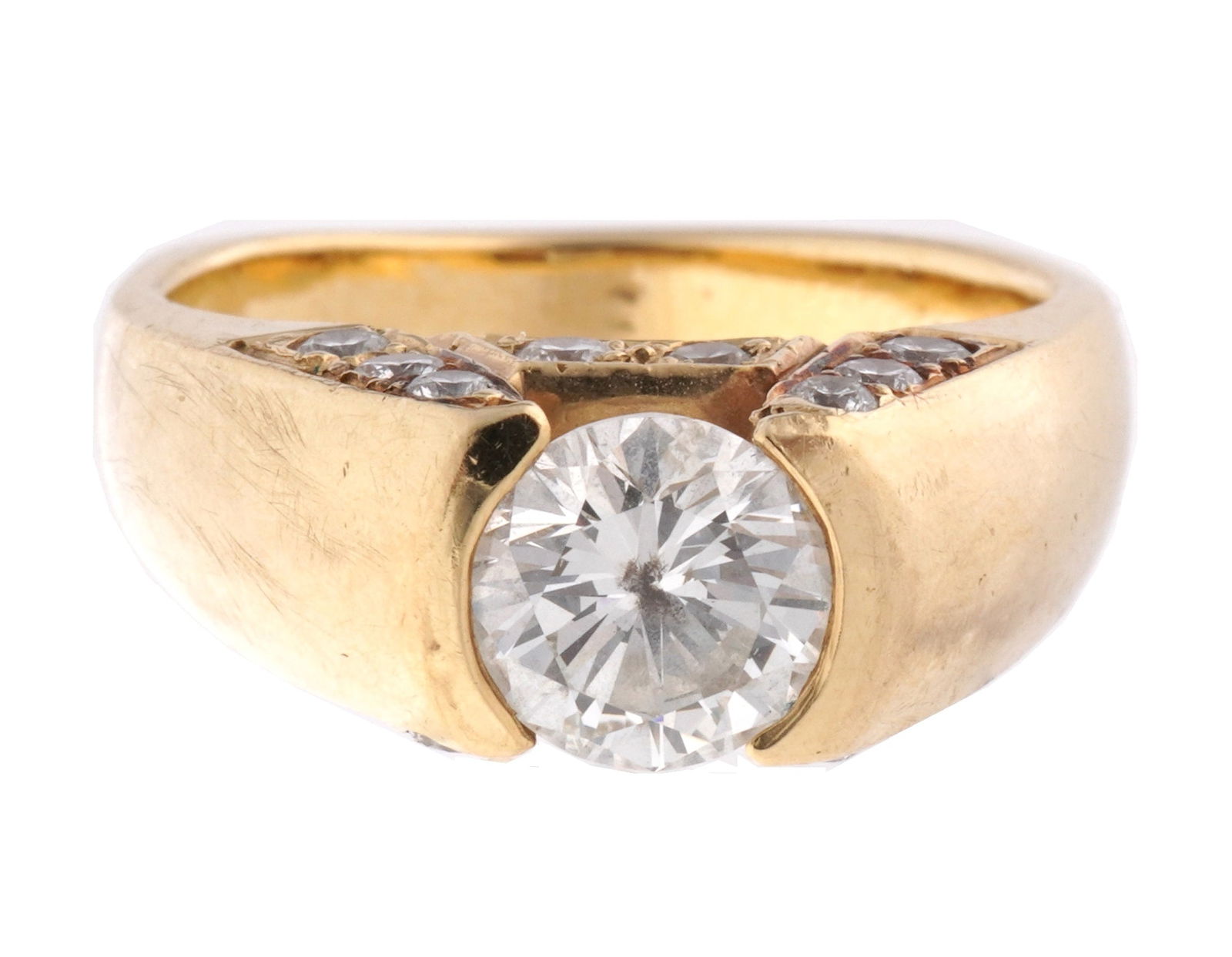 Barkev's 14k Gold and Diamond Pinky Ring: 14k yellow gold band, chanel set round diamond, approx. 1ct., collar with 16 prong set accents diamonds, approx. .25ctw. Size 5-5.25, approx 7.17 grams inclusive.
