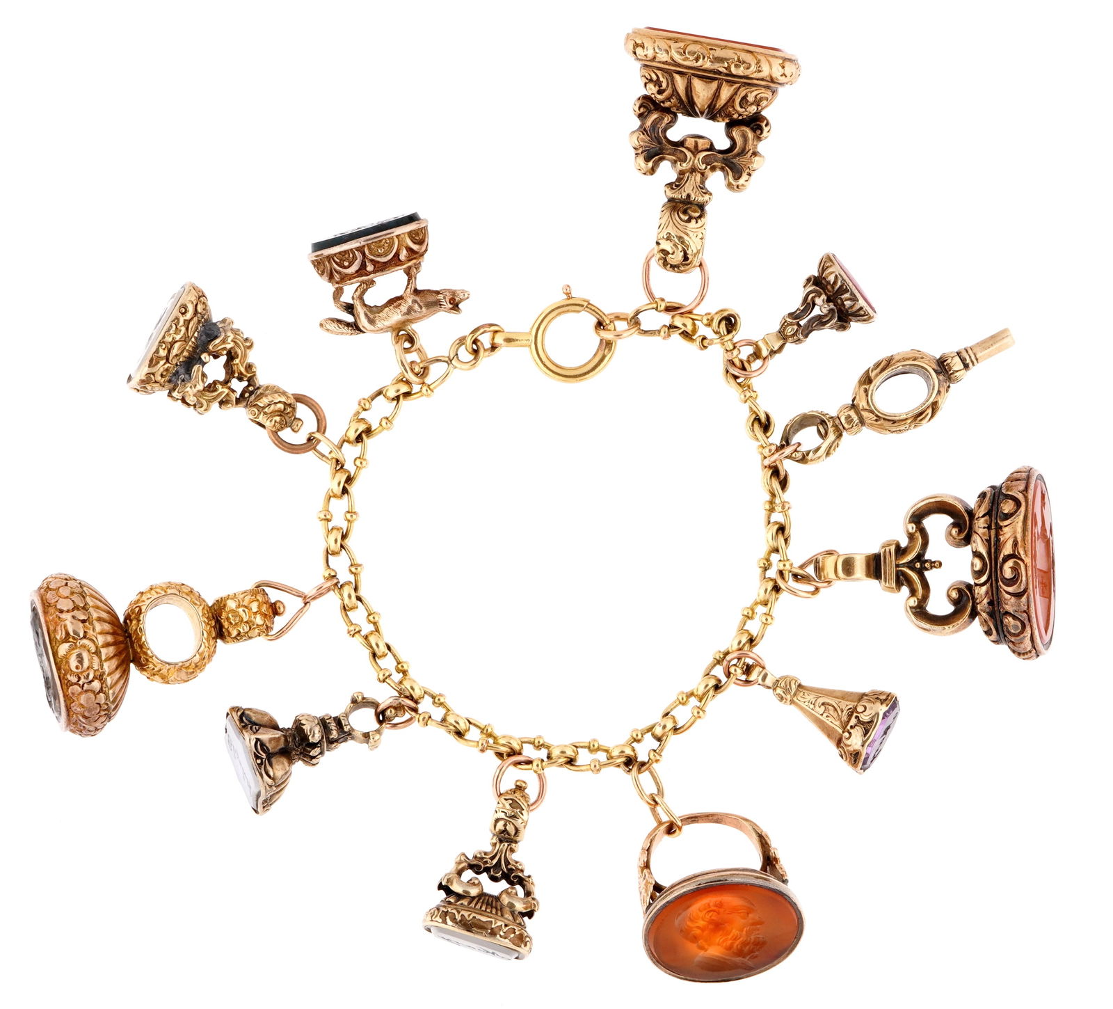 Victorian Intaglio Watch Fob Bracelet: Gold toned chain bracelet, ten fobs with intaglio semi precious stones to include pocket watch key, intaglio carnelian ring, three moonstone fobs, three carnelian fobs, amethyst fob, bloodstone fob. O