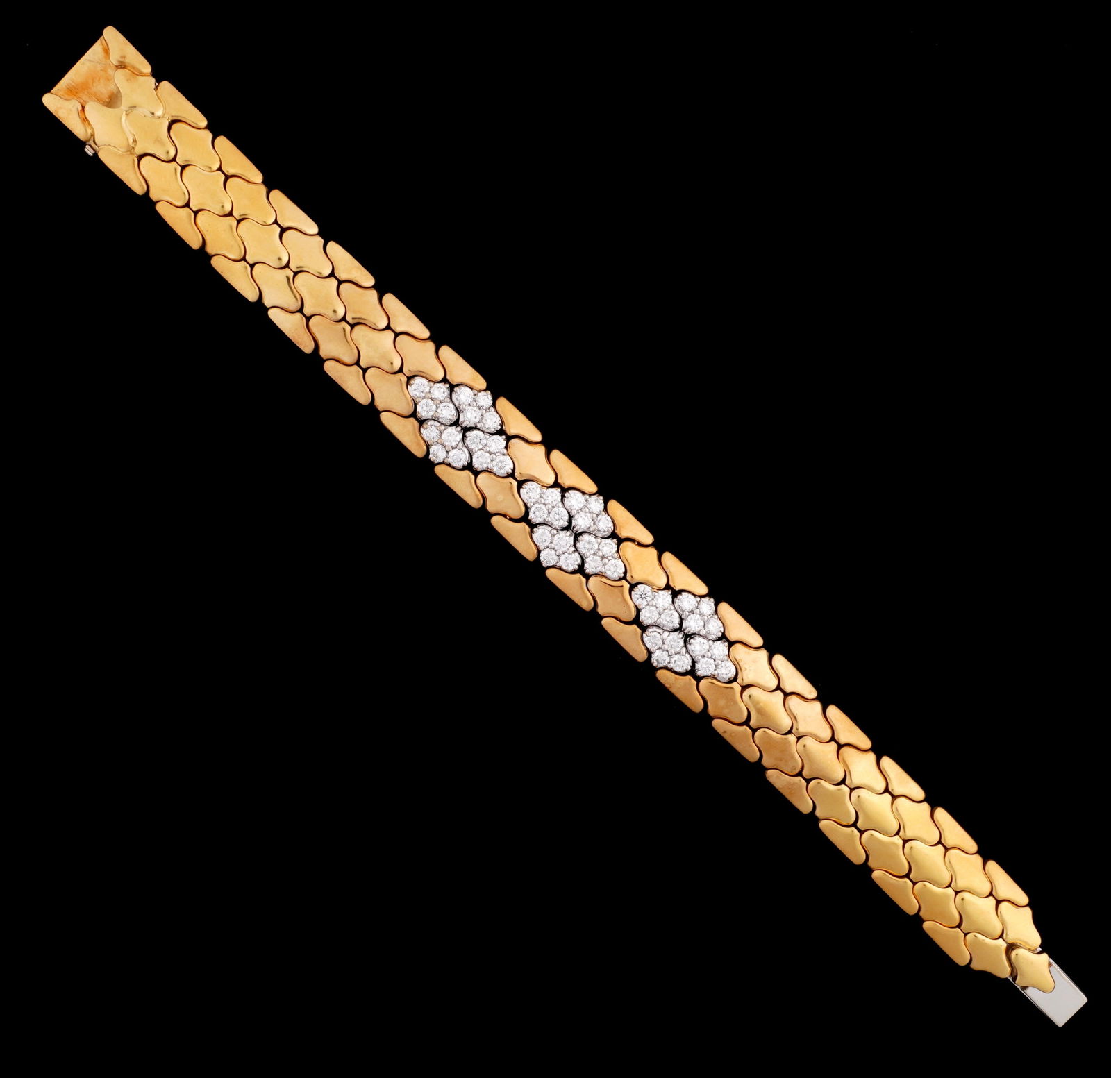 18k Gold and Diamond Lozenge Link Bracelet: 18k yellow gold lozenge link bracelet, 48 prong set round diamonds approx 6ctw, overall 7.25" long. Approx. 60 grams inclusive.