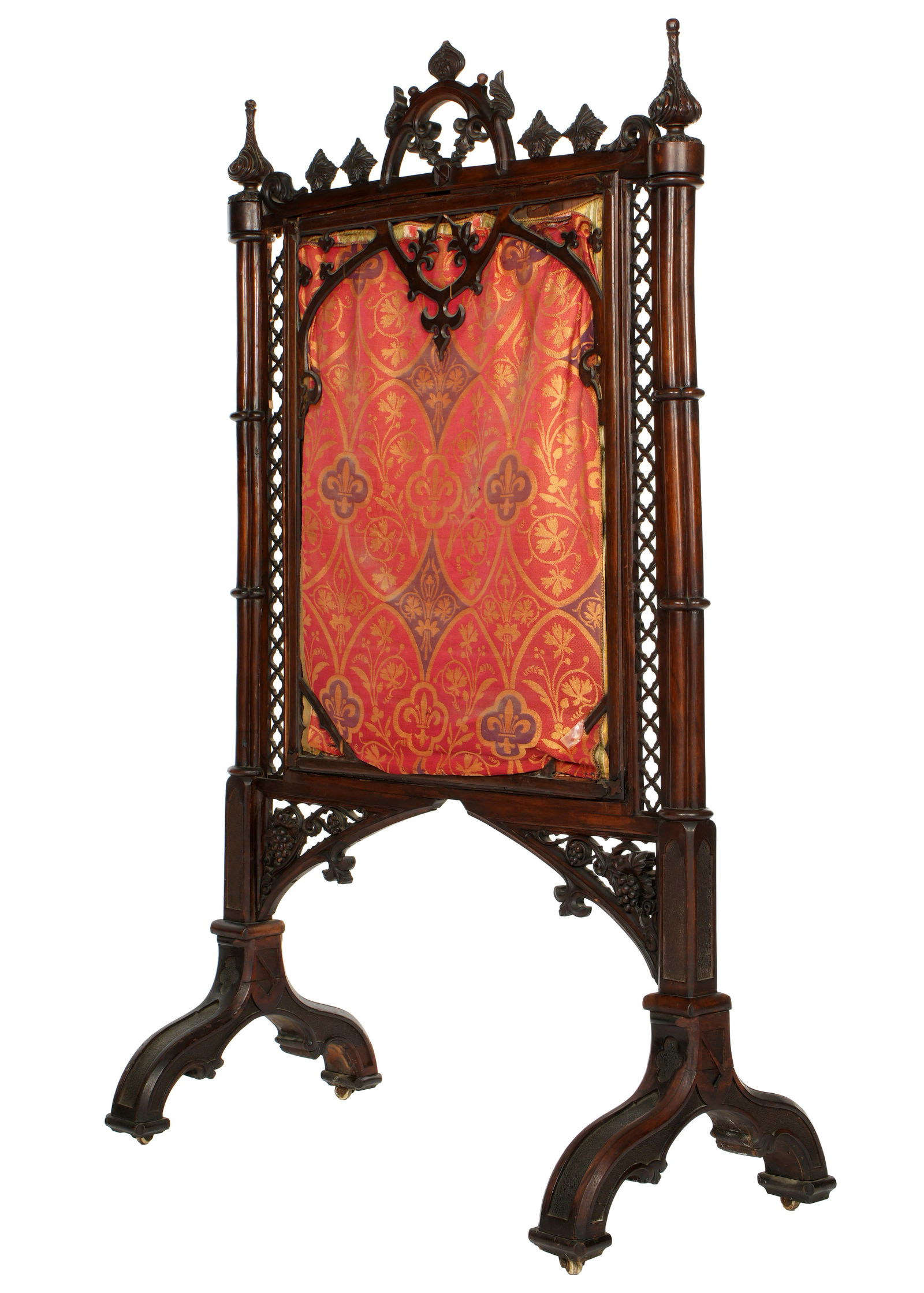 American Gothic Rosewood Fire Screen: Carved rosewood frame with reticulated side panels, center embroidered panel, splayed legs. Overall 58.5" h. x 34" x 18.5". Condition: Losses to one side panel, minor chips, fading, separation, and mi