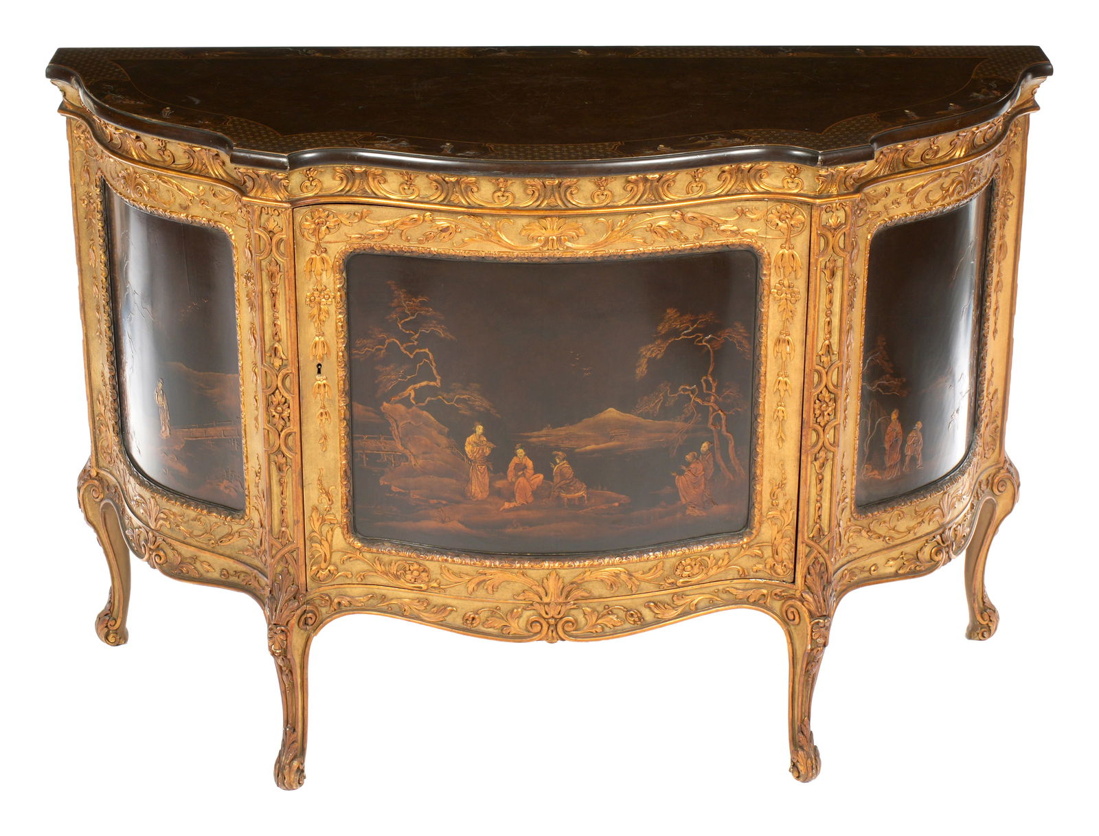 Carved Gilt Wood Chinoiserie Decorated Credenza: 20th Century, serpentine top over conforming single door case. Brown lacquer ground with chinoiserie painted motifs all over, case with carved gilt wood foliate accents. Shaped fluted legs ending in a