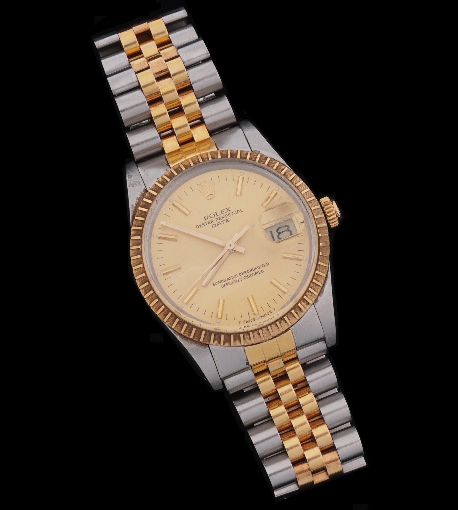 Rolex Oyster 18k & Stainless Steel Mens Watch: 35mm stainless steel and 18k gold case, gold dial, Oyster Perpetual Date. 18k gold and stainless steel band, fits a 6" wrist. No box or paperwork. Condition: Signs of wear and use to include scratches