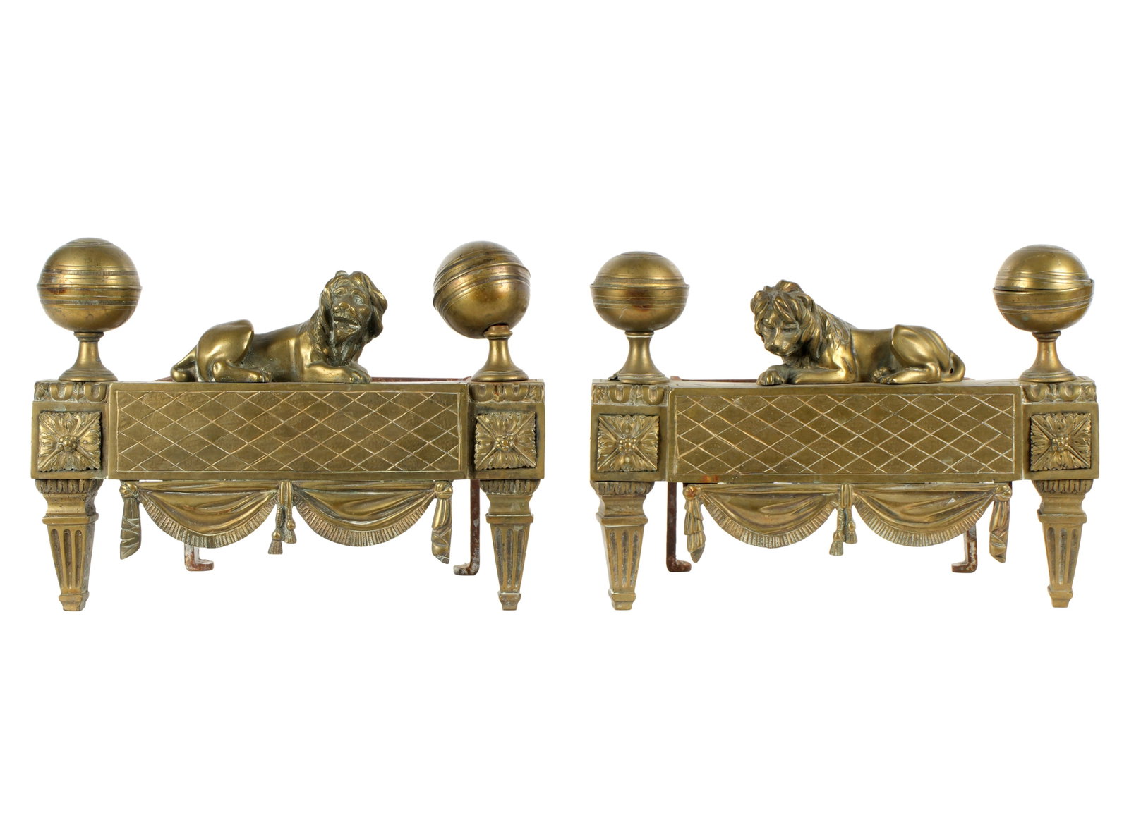Pair French Bronze Lion Chenets Andirons: Neoclassical design bronze chenets featuring ball finial and recumbent lions. Wrought iron billet bars. Overall 10" h. x 13.5" x 14.25". Condition: Uneven patina, one finials with missing section of c