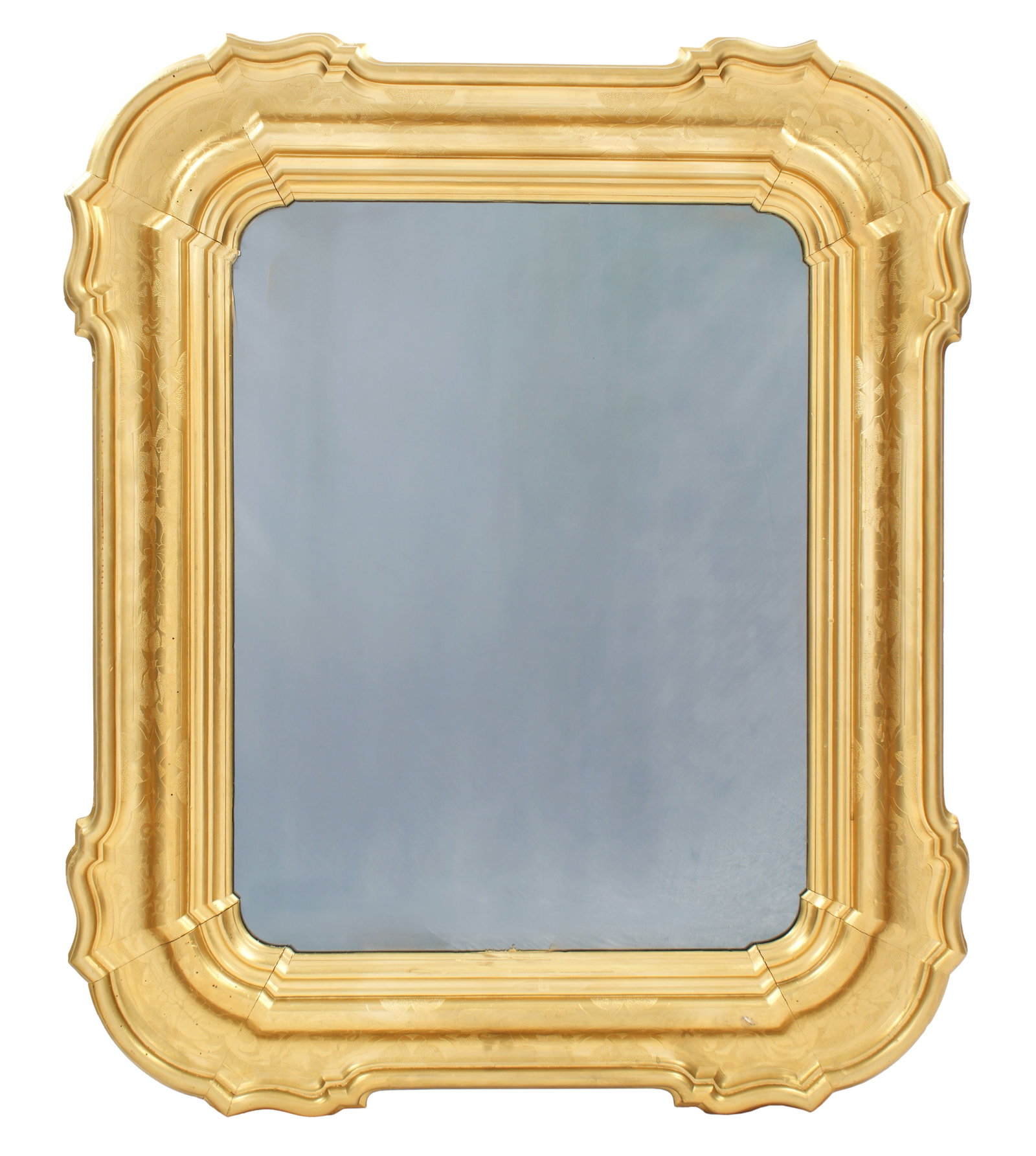 French Louis Philippe Carved Gilt Wood Mirror: 19th Century. Carved and shaped gilt wood frame with foliate and geometric motifs, conforming dark glass mirror. Overall 50" x 41.25" x 2.5". Condition: Minor age separations and wear to gilt.