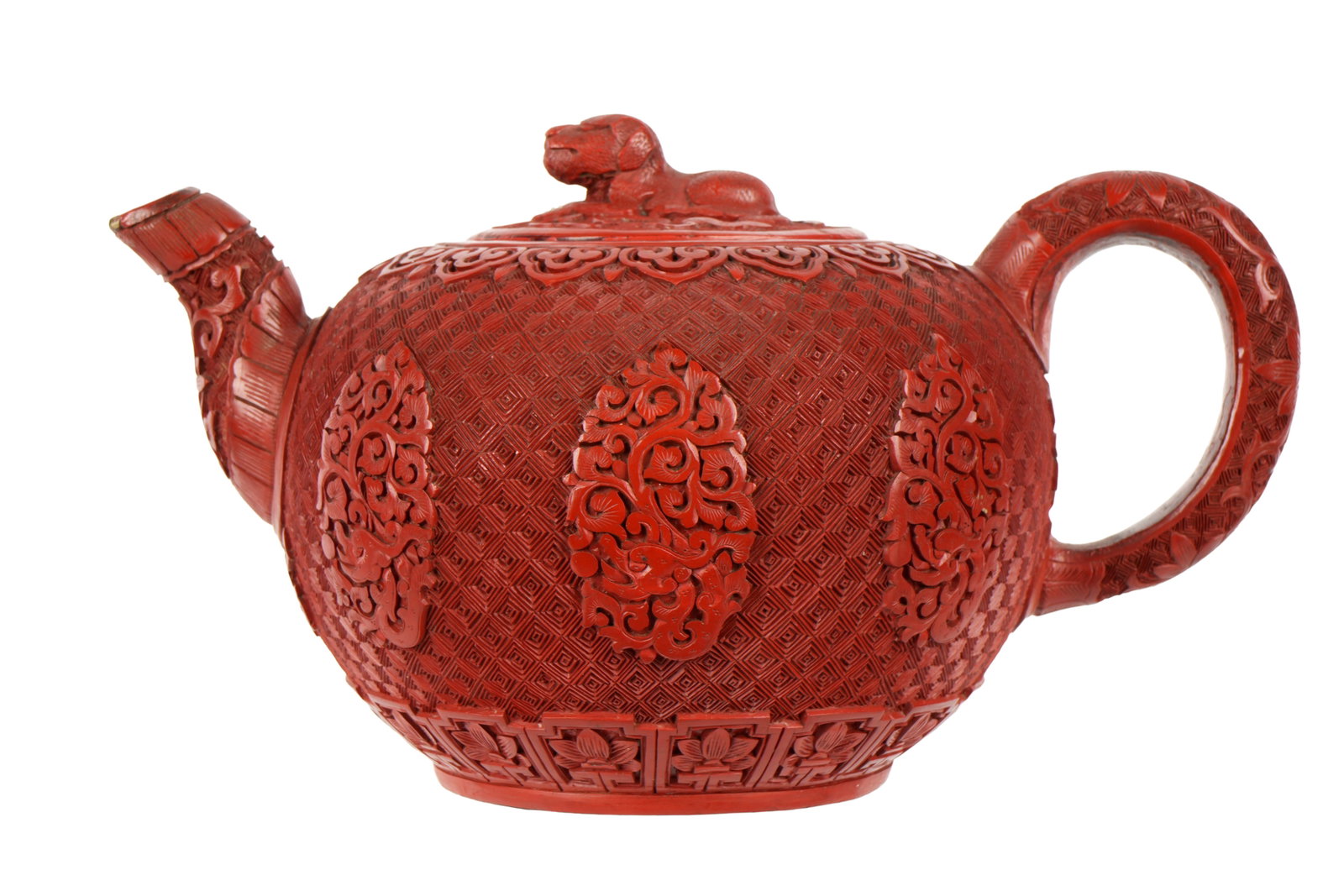 18th C. Chinese Yixing Cinnabar Lacquered Teapot: 18th Century, profusely and finely carved all over, recumbent lion finial on lid, black lacquer interior and base. Overall 3.75" h. x 7.25". Condition: Repairs to lid rim, minor chips and abrasions.