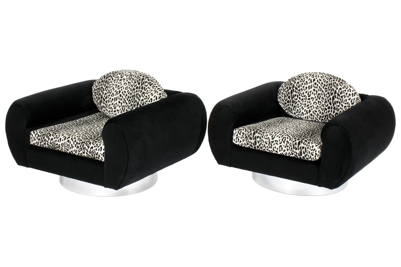 Pair attributed Thayer Coggin Modern Club Chairs: attributed to Thayer Coggin, black upholstery all over, round chrome bases, black leopard print cushions. No labels, overall 22" h. x 39" x 35". Seat height 17".