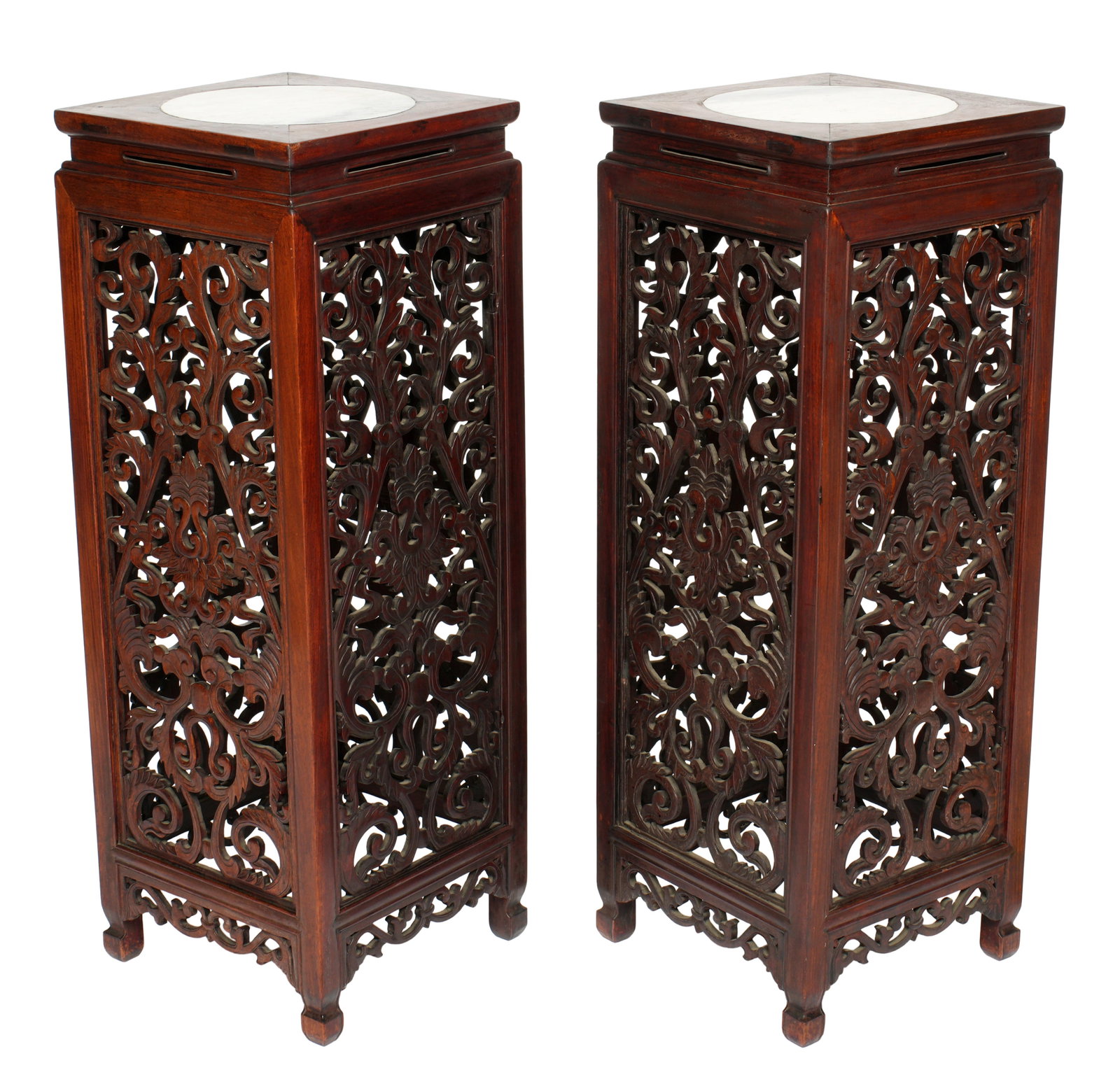 Pair Chinese Carved Rosewood & Moonstone Stands: Pair tall rosewood pedestal, round inset moonstone tops, profuse reticulated carved foliate scroll motif sides, on four feet. Overall 39" h. x 14" x 14".