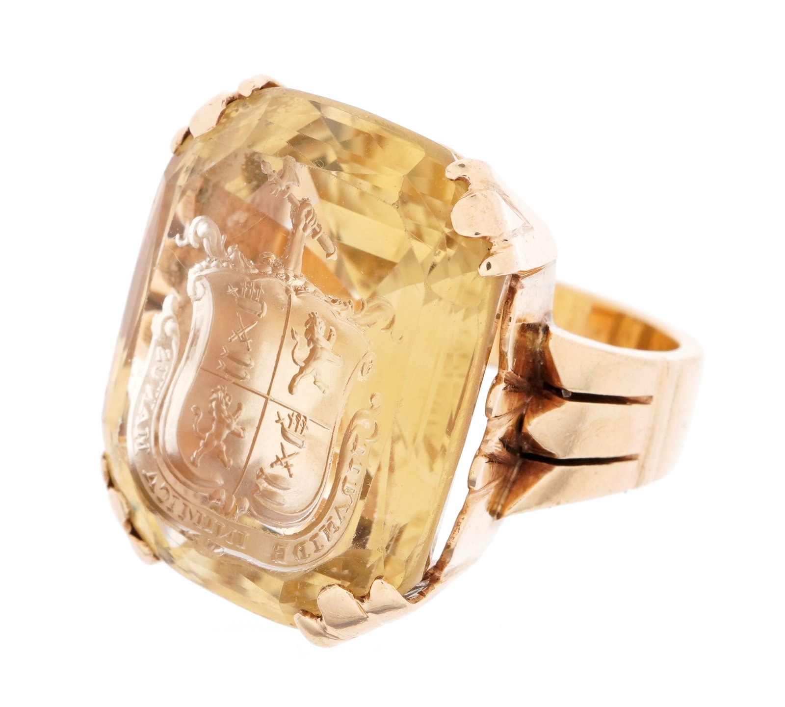 Large 14k Gold and Citrine Mens Signet Pinky Ring: Heavy 18k yellow gold band, prong set rectangular citrine inscribed with heraldic shield and motto "Tiraide Inimica Manus" in reverse, citrine approx. 25mm x 20mm x 10mm. Size 4.5-5. Approx. 19.4 gram