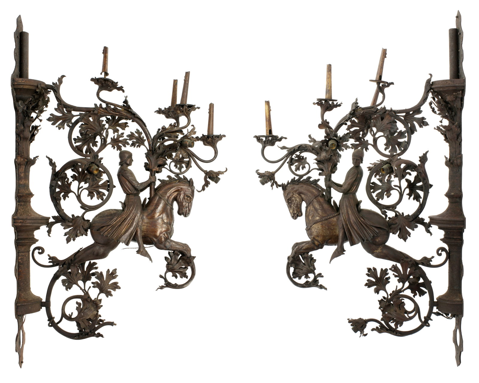 Pair Palatial Iron Horse and Rider Wall Sconces: Reputedly from the Hearst estate and purchased in the 1990's, A majestic pair of extremely large cast and wrought iron 10 light sconces. Depiction of a Renaissance style figure riding a horse,