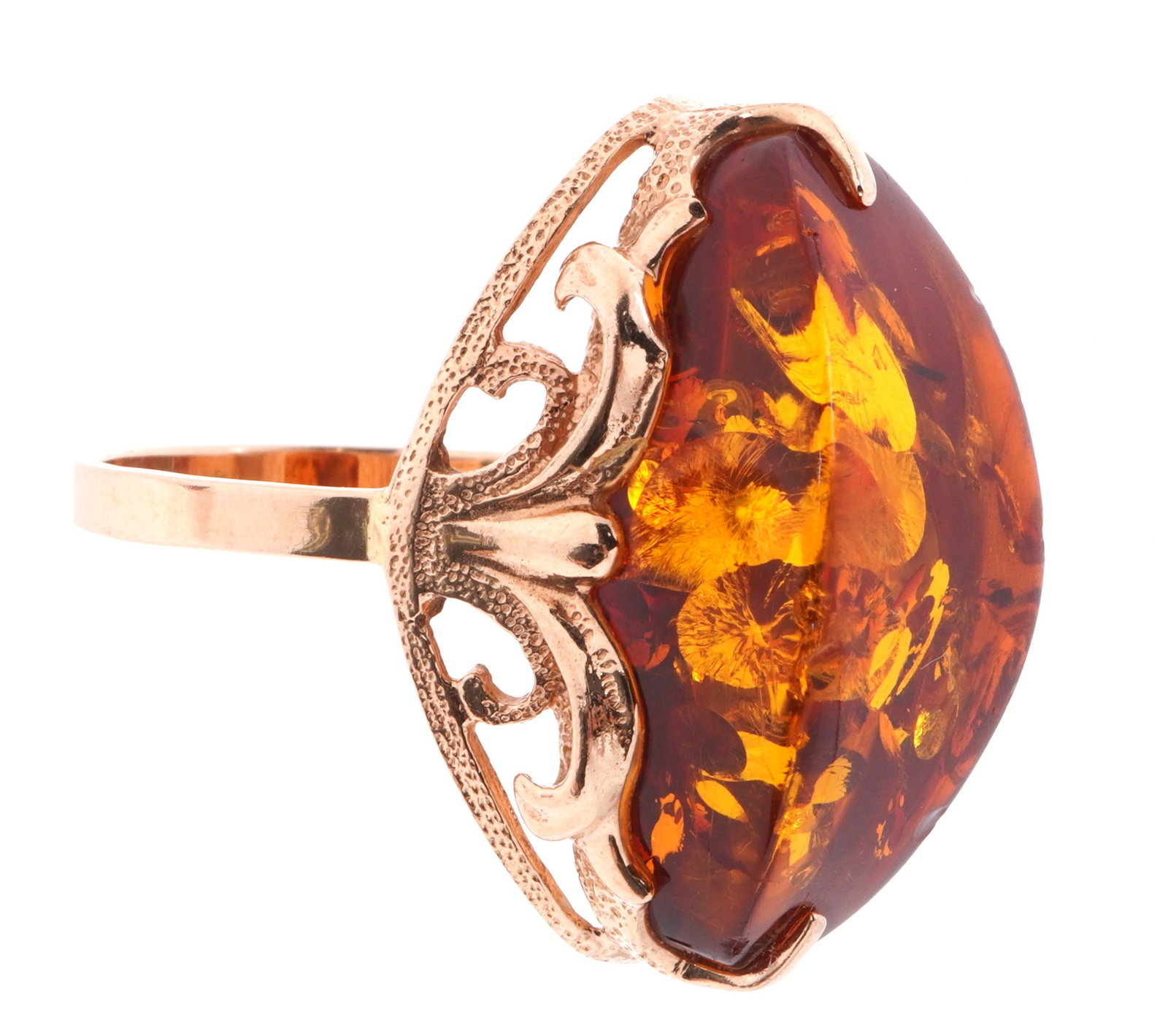 Russian 14k Gold and Baltic Amber Ring: Stamped with post revolution Russian gold 58 mark and unknown makers mark, yellow gold band with filigree collar, prong set Baltic amber, 25mm x 12mm x 10mm deep. Size 7. Approx. 5.5 grams inclusive.