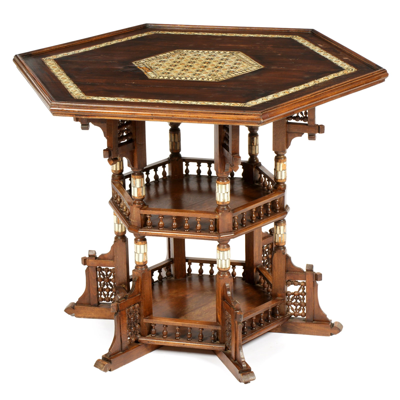 Moroccan / Syrian Hexagonal Inlaid Center Table: Hexagonal top, geometric bone inlaid center medallion and band. Inlaid bone turned support, center stick and ball gallery middle shelf, matching lower shelf. Six mashriabiya panel feet. Overall