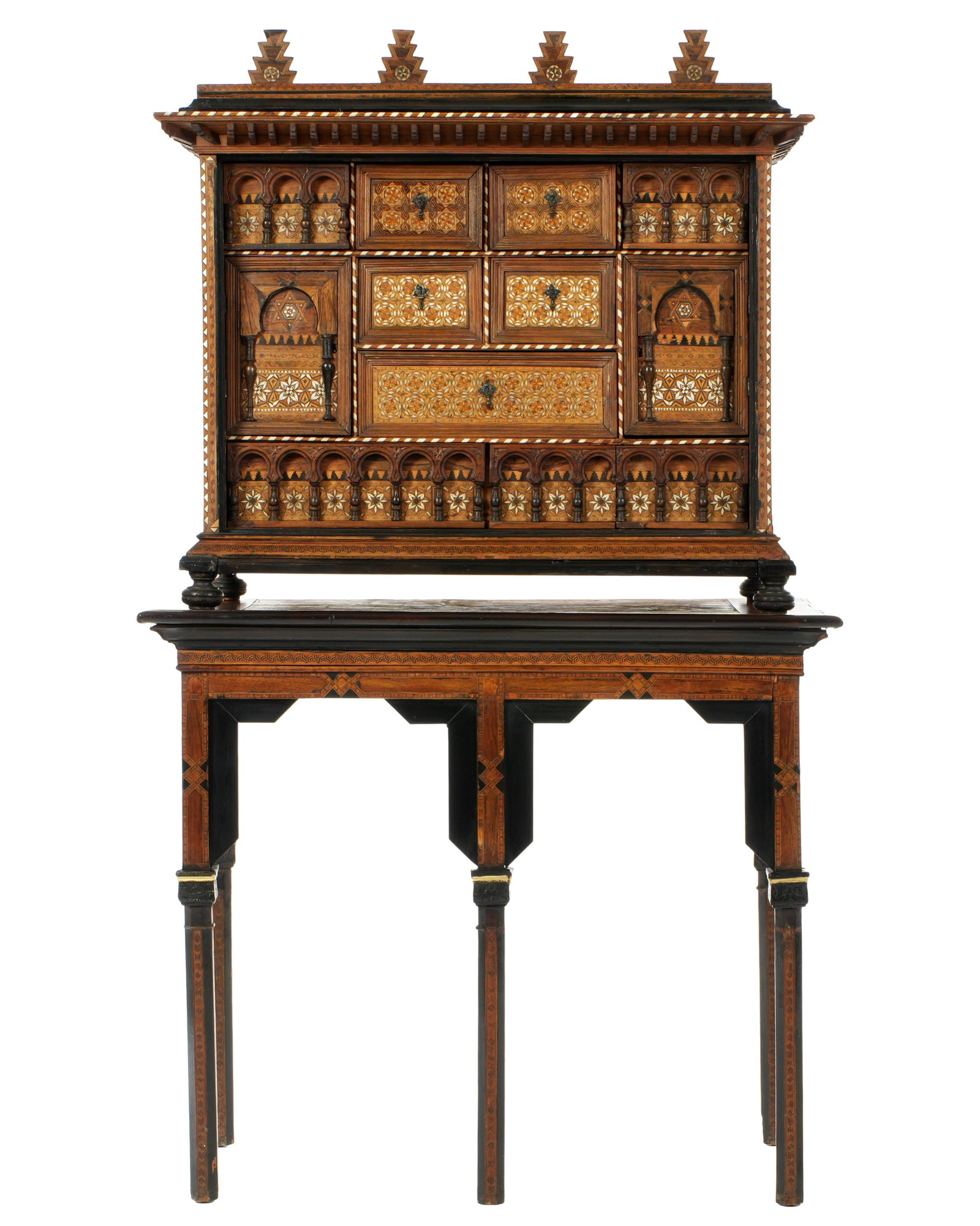 Ornate 19th Century Syrian Inlaid Chest on Stand: Profuse mixed wood and mother of pearl parquetry inlay all over, crest with four geometric finial, fitted case with nine drawers and two doors, turned balustrade accents. Parquetry inlaid sides, all