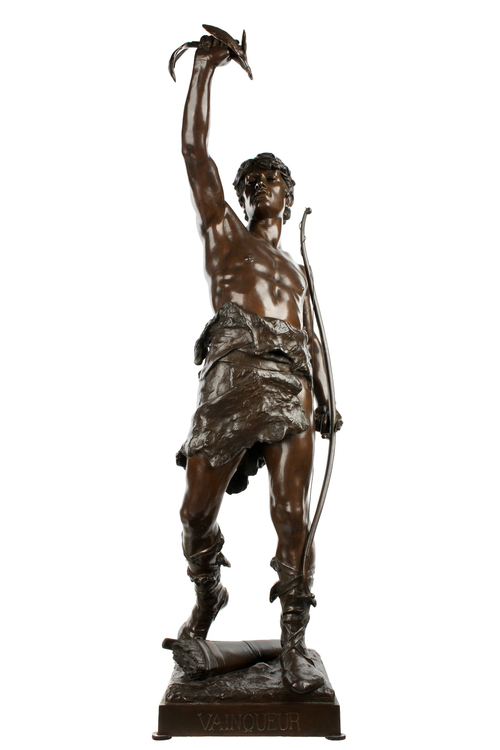 Eugene Marioton Vainquer Bronze Sculpture: MARIOTON, Eugene, (French, 1854-1933): "Vainqueur", figure of a man clad in animal skins, holding a bow in one hand, branch in the other, signed and titled on base, overall 36.5" h. x 10" x 13".