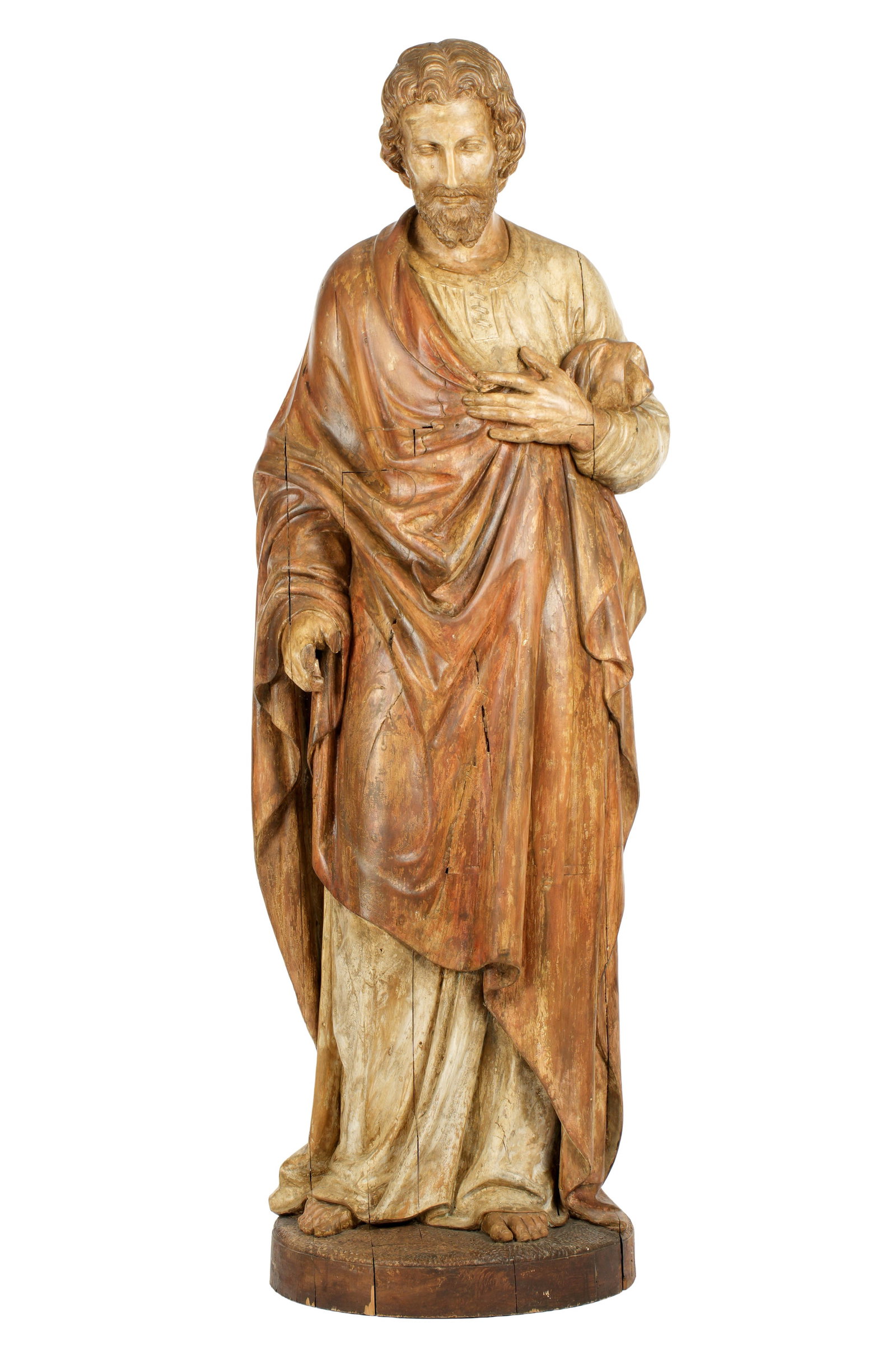 5' Tall Carved Saint Joseph Santos Figure: Nearly life sized carved and polychrome painted wood Santos figure of Saint Joseph standing on round wood base. Overall 66" h. x 21" x 14". Condition: Chips, age cracks, and losses. Paint flake.