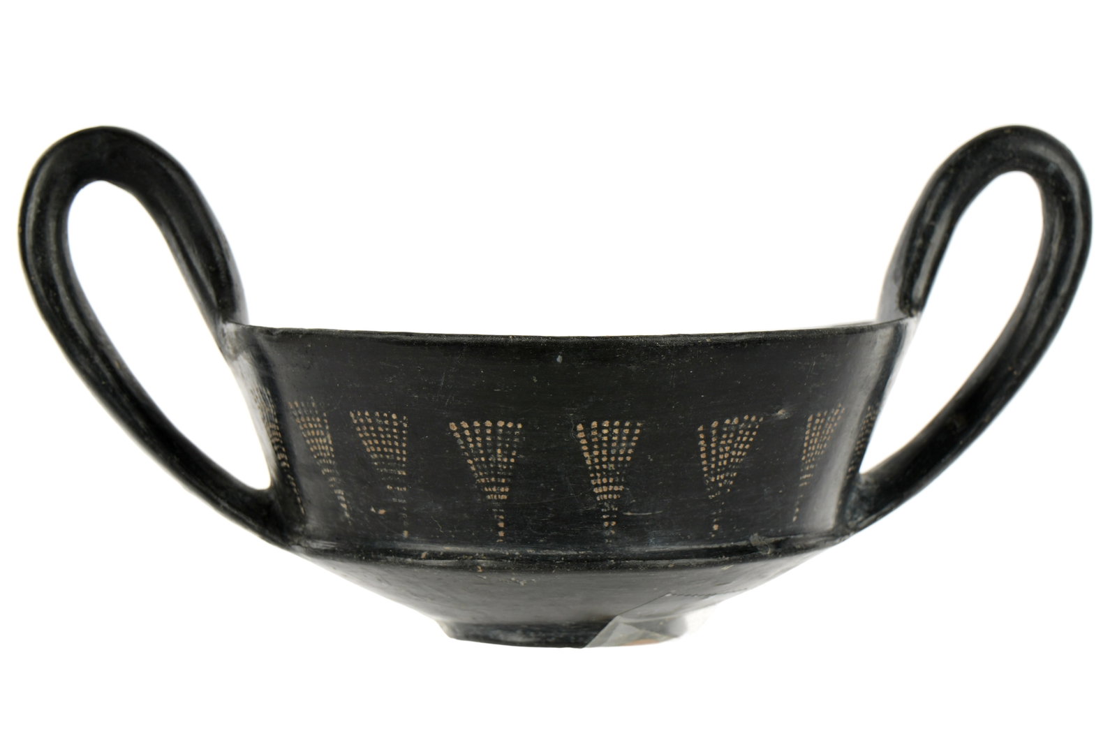Etruscan Bucchero Kantharos with Wheat Fronds: circa 768-264 BC, Etruria. High handles, stippled dot wheat fronds on body, small circular foot. Overall 3" h. x 6.5". Provenance: Private Collection in Sarasota, purchased Arte Primitivio. Ex. Artemi