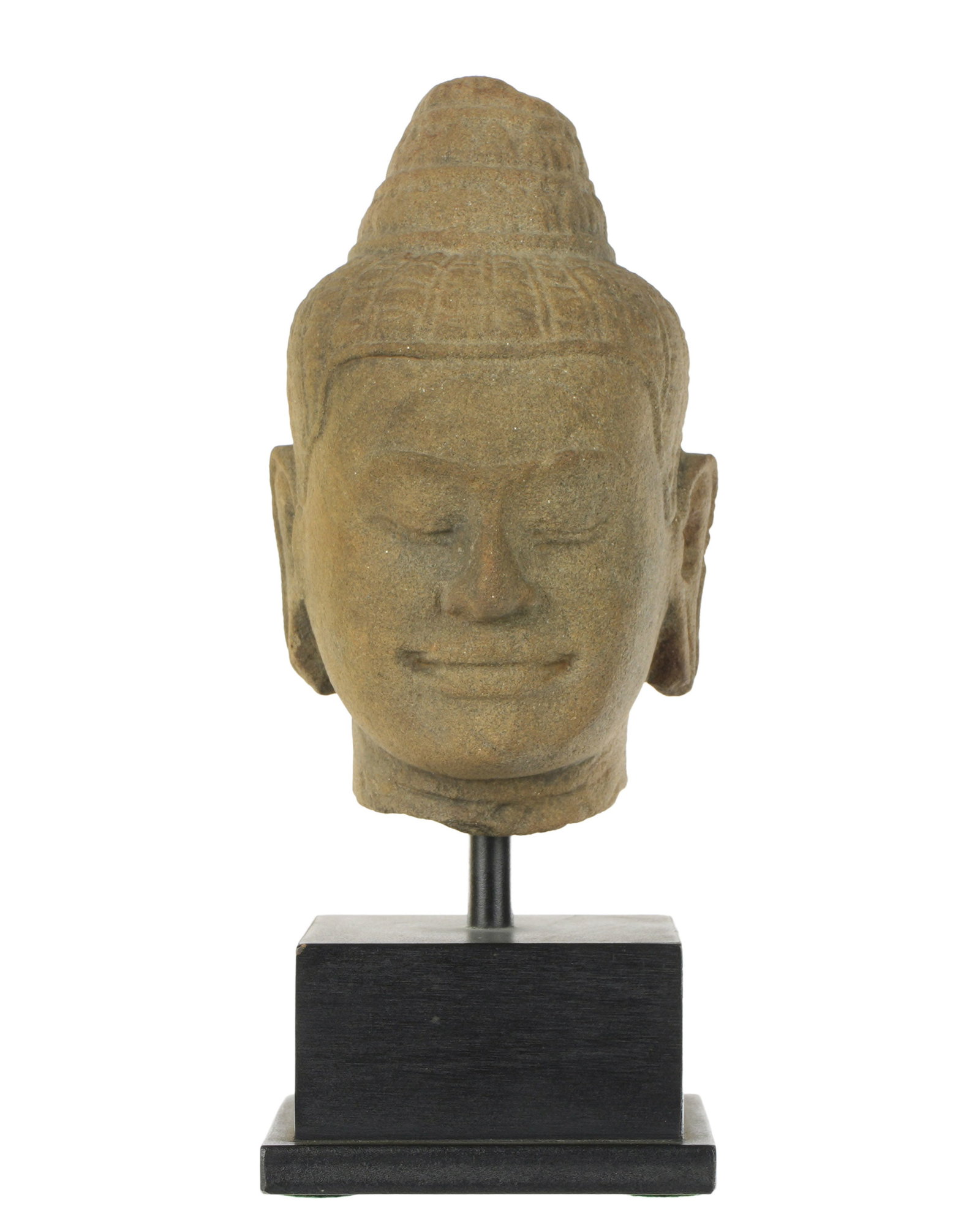 Ghanharan Grey Schist Stone Buddha Head: Pakistan / Afghanistan, circa 2nd - 4th Century AD, nicely carved stone bust of Buddha, 6.25" h. x 3.5" x 5.25", affixed to metal stand, overall 8" h.. Provenance: Private Collection in Sarasota.