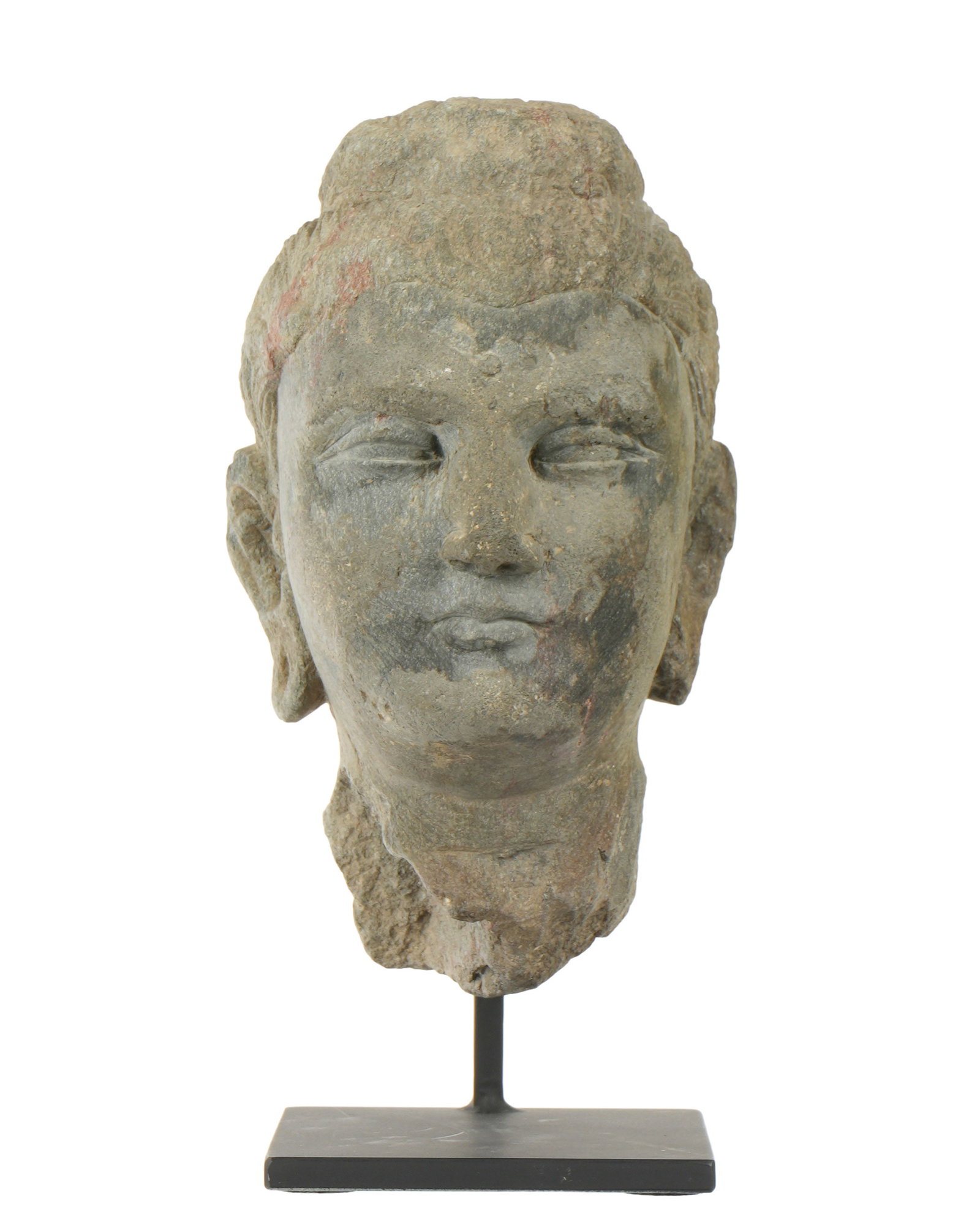 Cambodian Khmer Sandstone Bust of Buddha: Cambodia, 11th Century AD, sandstone bust of Buddha with rectangular lips, 5.75" h. x 3.25" x 3.5". Provenance: Private Collection in Sarasota, purchased Harlan J. Beck auction. Sold with a stand