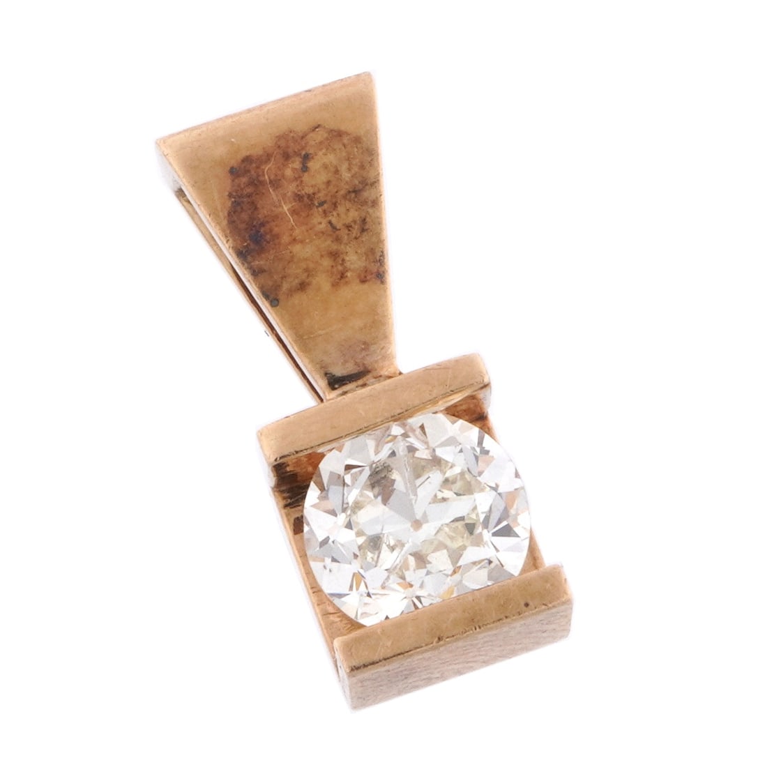 Gold and Diamond Solitaire Pendant: Yellow gold pendant, channel set round diamond solitaire, approx. .62ct. 5/8" x 1/4". Unmarked, awaiting testing for gold fineness, to be updated. Approx. 2.5 grams.