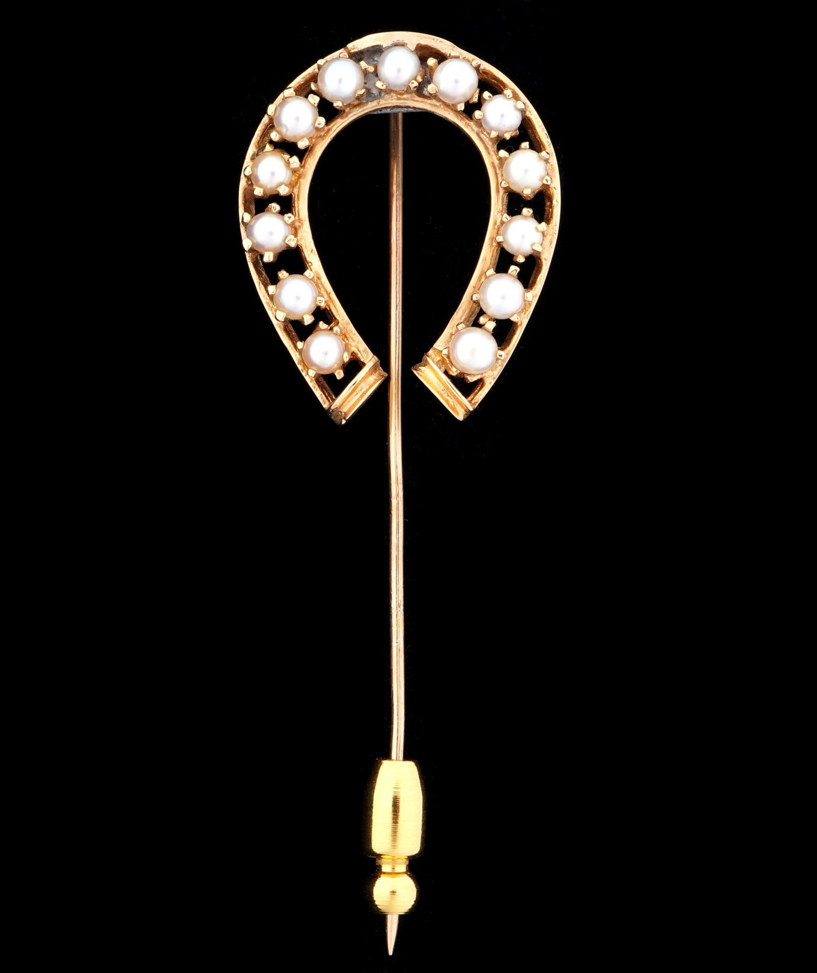 14k Gold and Seed Pearl Horseshoe Brooch Pin: Stamped 14k yellow gold horseshoe form brooch, 13 prong set seed pearls average 3mm each. Overall 2.5" long. Approx. 4.6 grams inclusive.