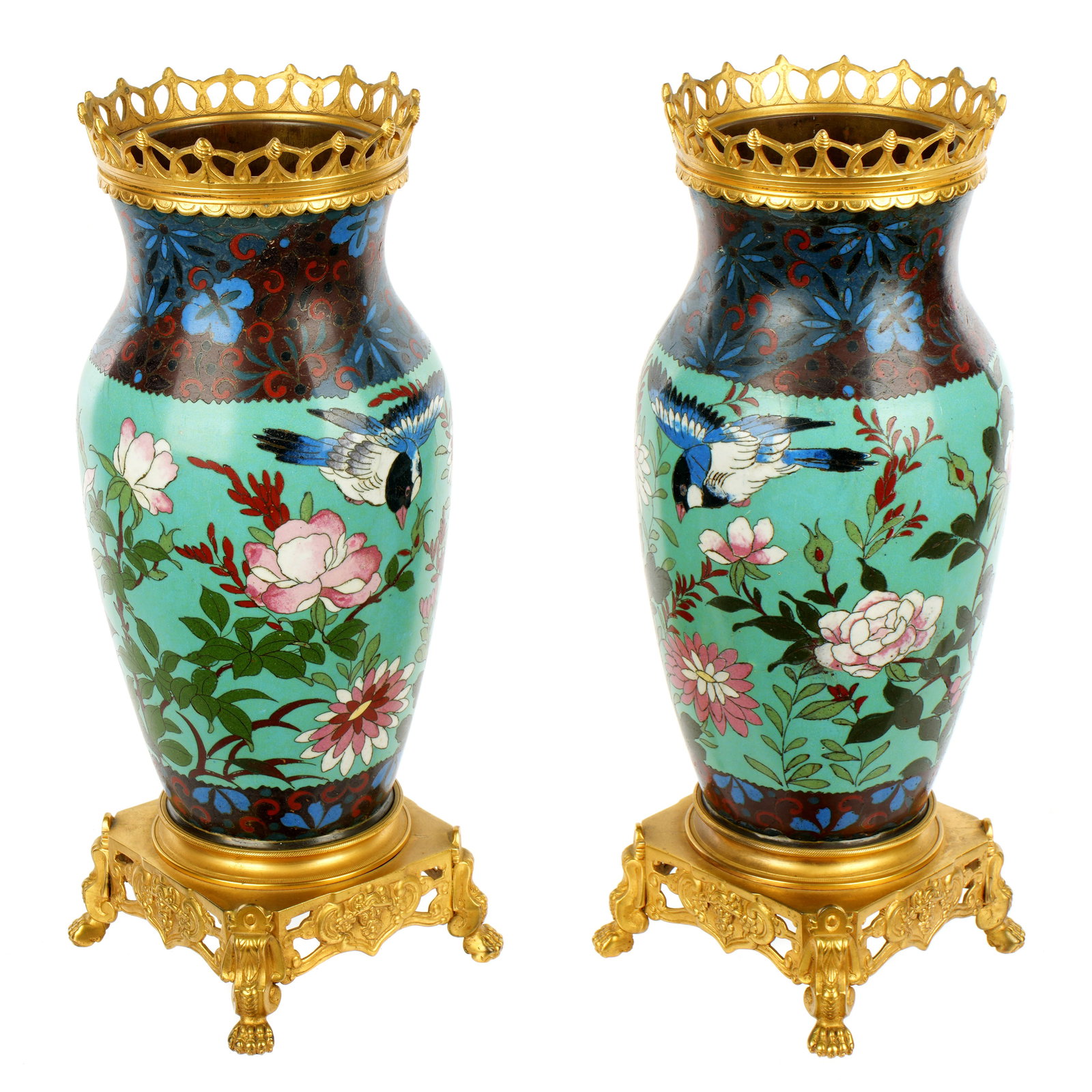 Pair Chinese Gilt Mounted Cloisonne Vases: Matched pair with enamel floral bands at top and bottom, blue/green ground, flowers, birds, and butterflies. Gilt metal top rim and base. Impressed mark to base. Overall 15" h. x 5.25" x 5.25".