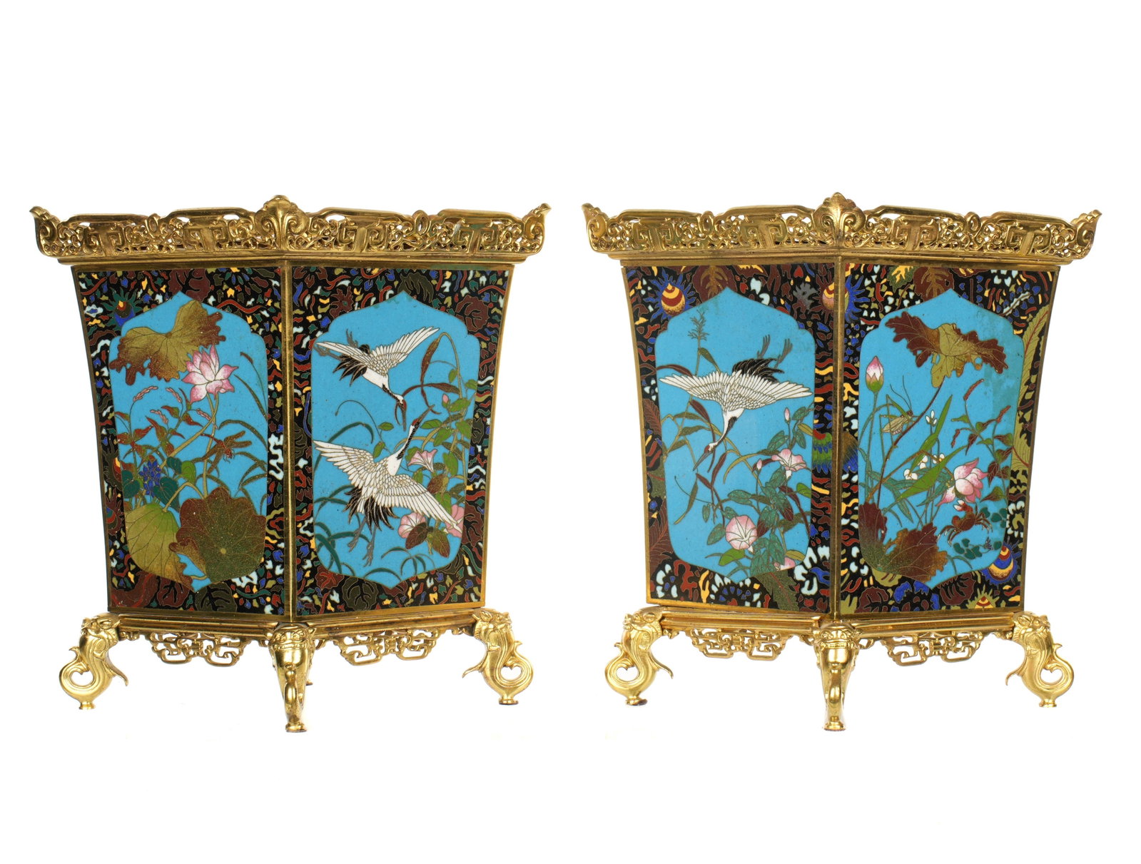 Pair Chinese Gilt Metal Cloisonne Planters: Pair diamond form planters, floral borders, turquoise ground, birds, flowers, and foliage on sides. Gilt bronze top rims, bases, and removable insert. Overall 9.25" h. x 9.75" x 7.5".
